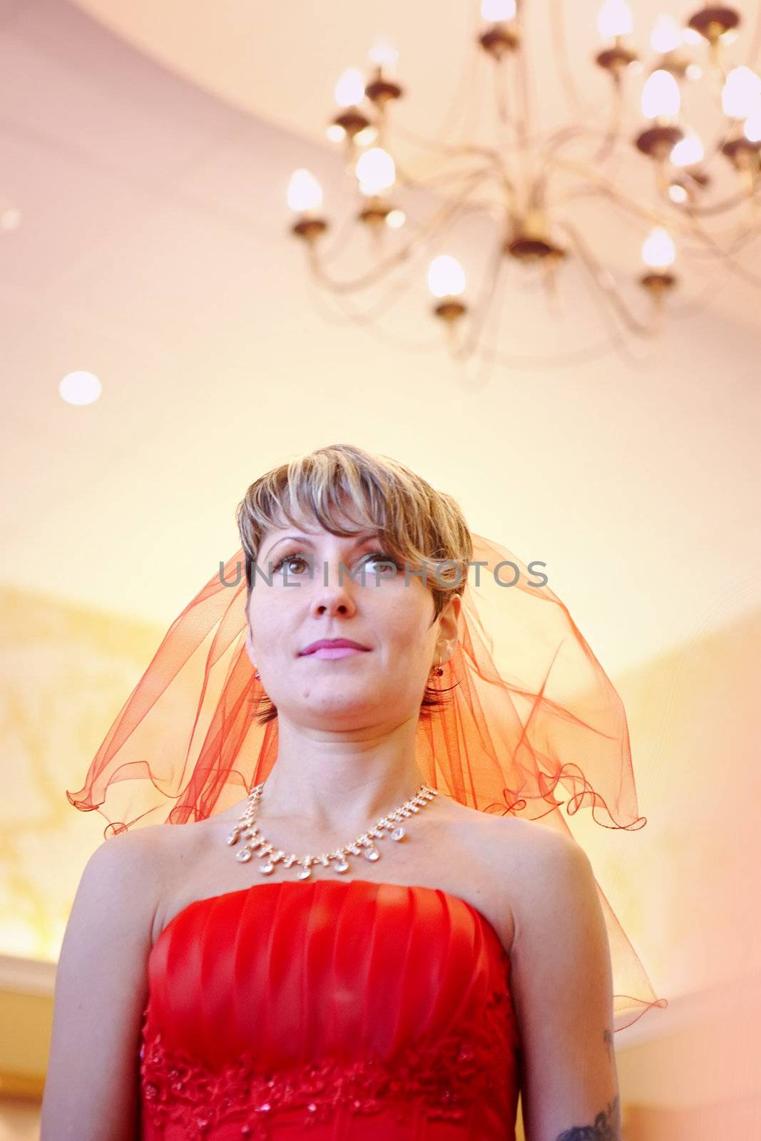 The girl bride in a red dress by Azaliya