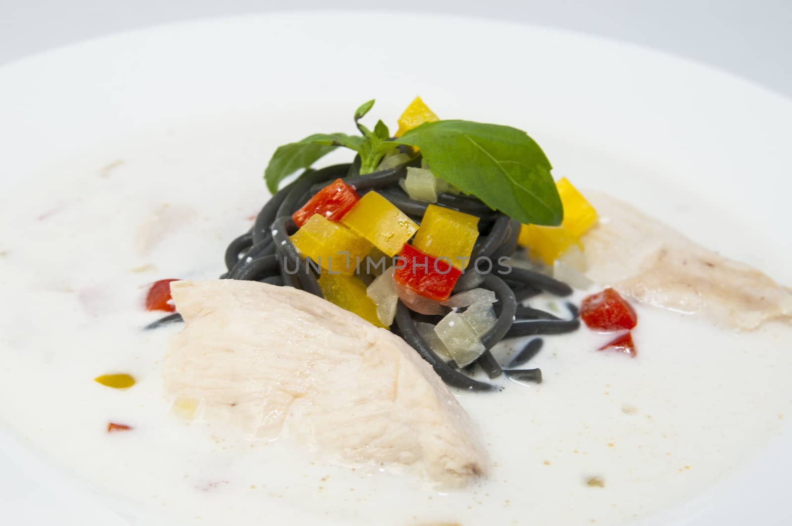white with black spaghetti soup with chicken