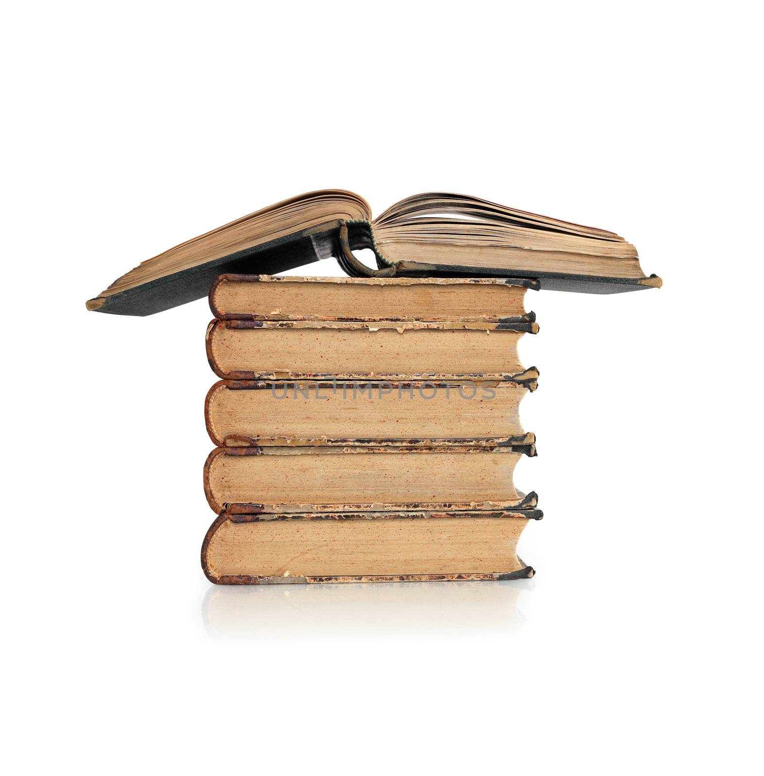 Stack of old books on white background. Clipping path is included