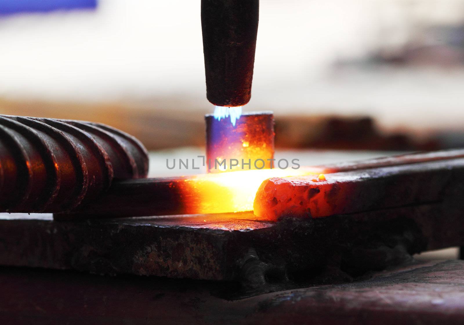 Gas heating cutting metal using torch and bending square bar