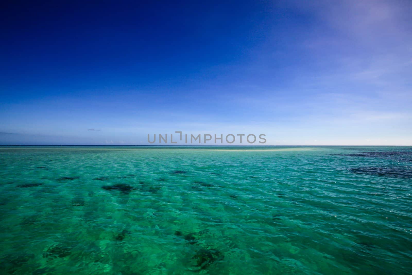 Beautiful Fiji atoll island with white beach by hangingpixels