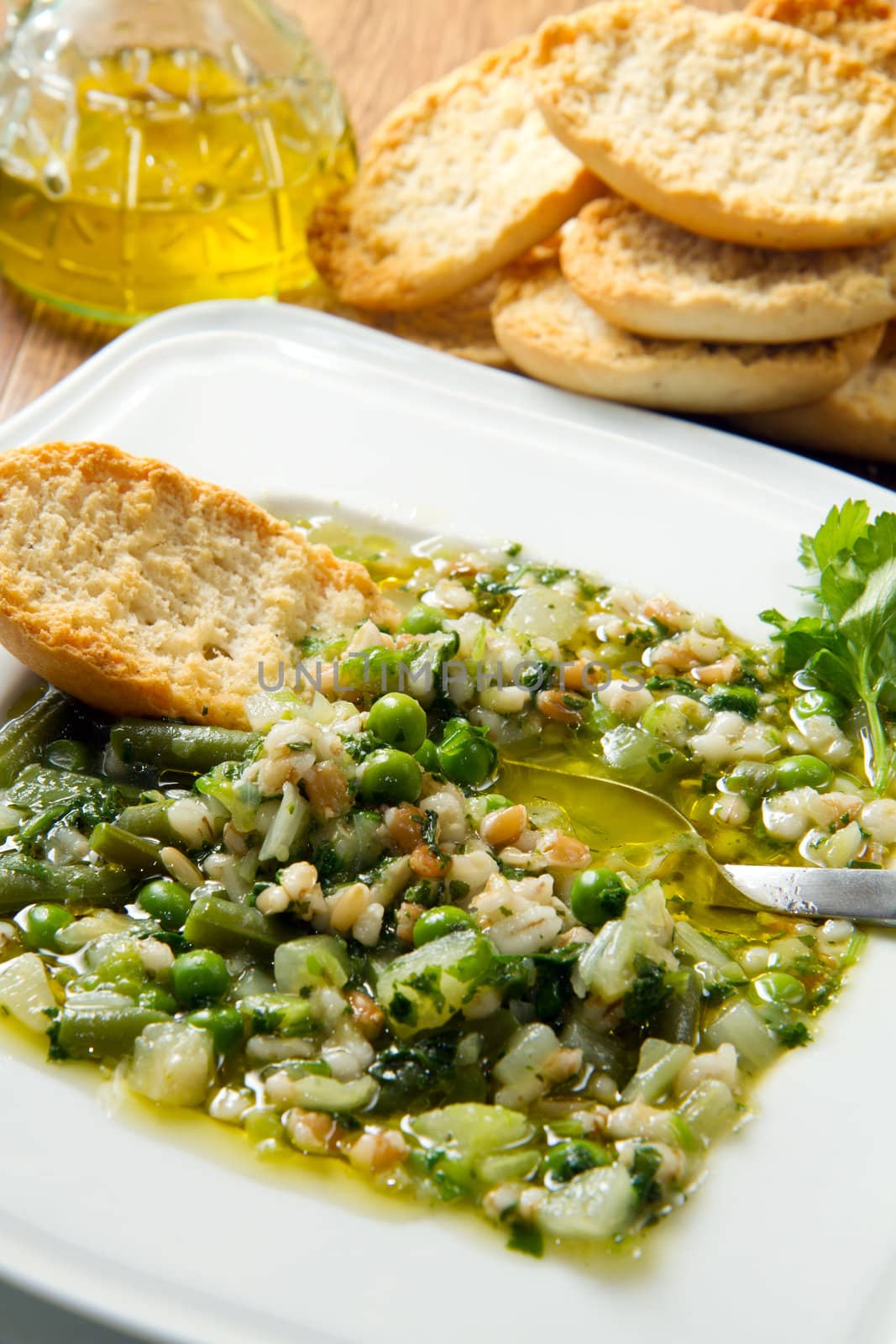 soup vegetable  with crouton on on white dish by lsantilli