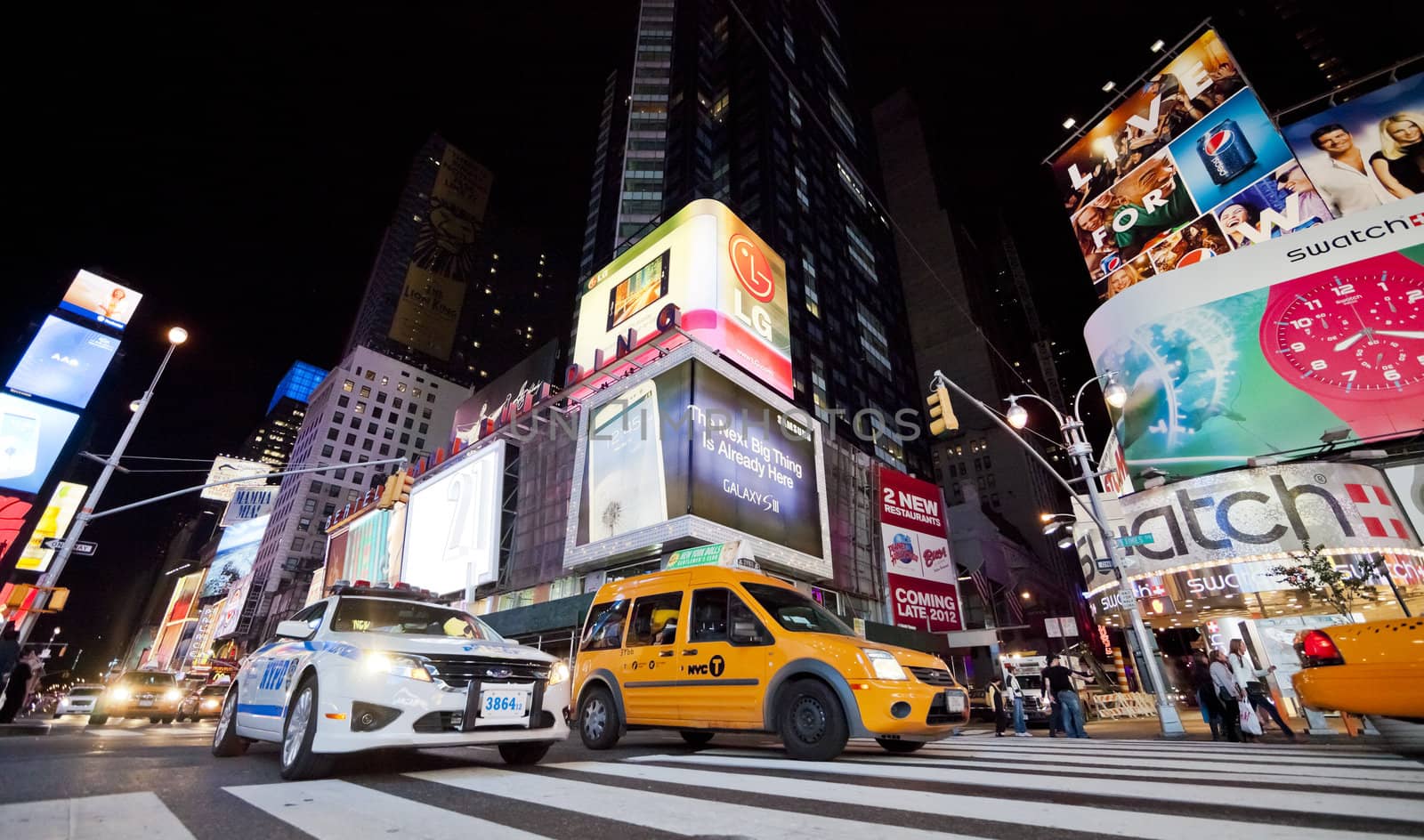 NEW YORK CITY - SEPT 25: Times Square, featured with Broadway Theaters, Taxi Cabs and animated LED signs, is a symbol of New York City and the United States, September 25, 2012 in Manhattan, New York City