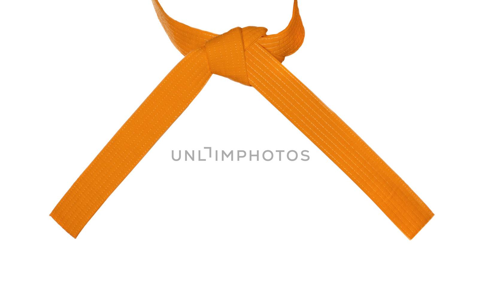 Karate orange belt tied tied in a knot
