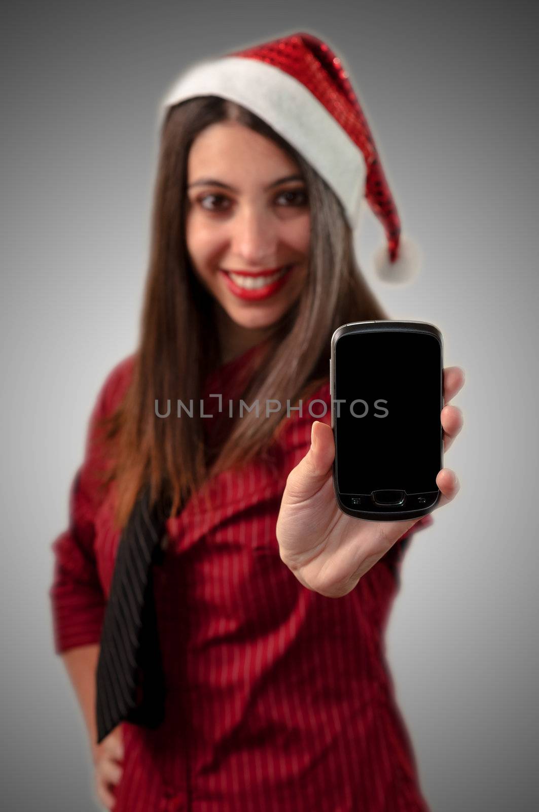 smiling business christmas showing smartphone by peus