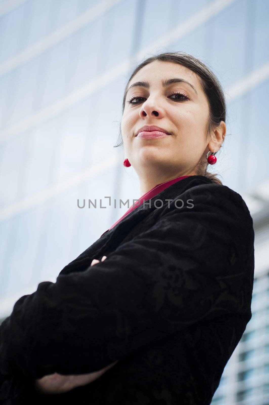 business girl in front of a modern building