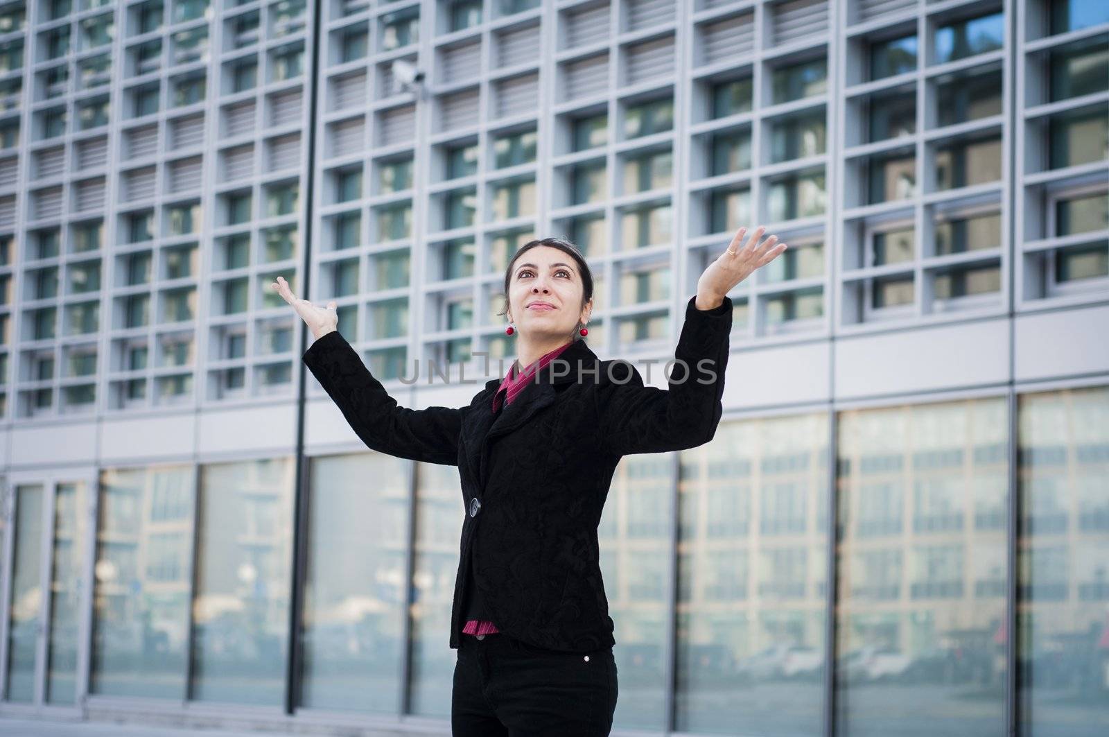 success business girl in front of modern landscape