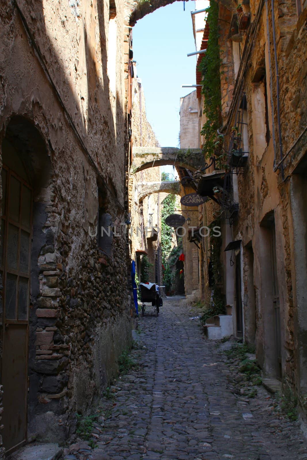 Narrow street in old Bussana, a village destroyed by an earthquake and then abandoned. It is now an International Artists Village