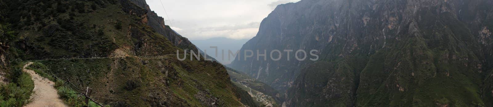 Panoramic photo of the Tiger Leaping Gorge, on of the most spectacular trekking in all China. This photo is made attaching together several pictures.
