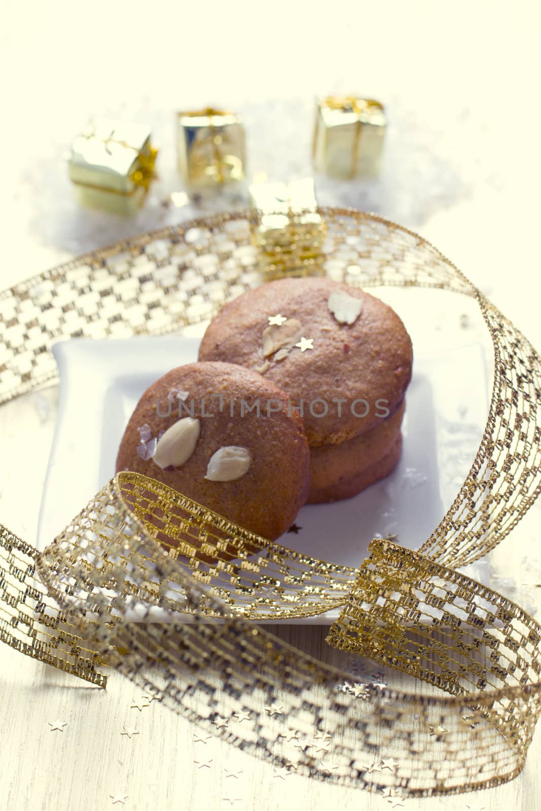 Cookies with nuts on the background of Christmas gifts