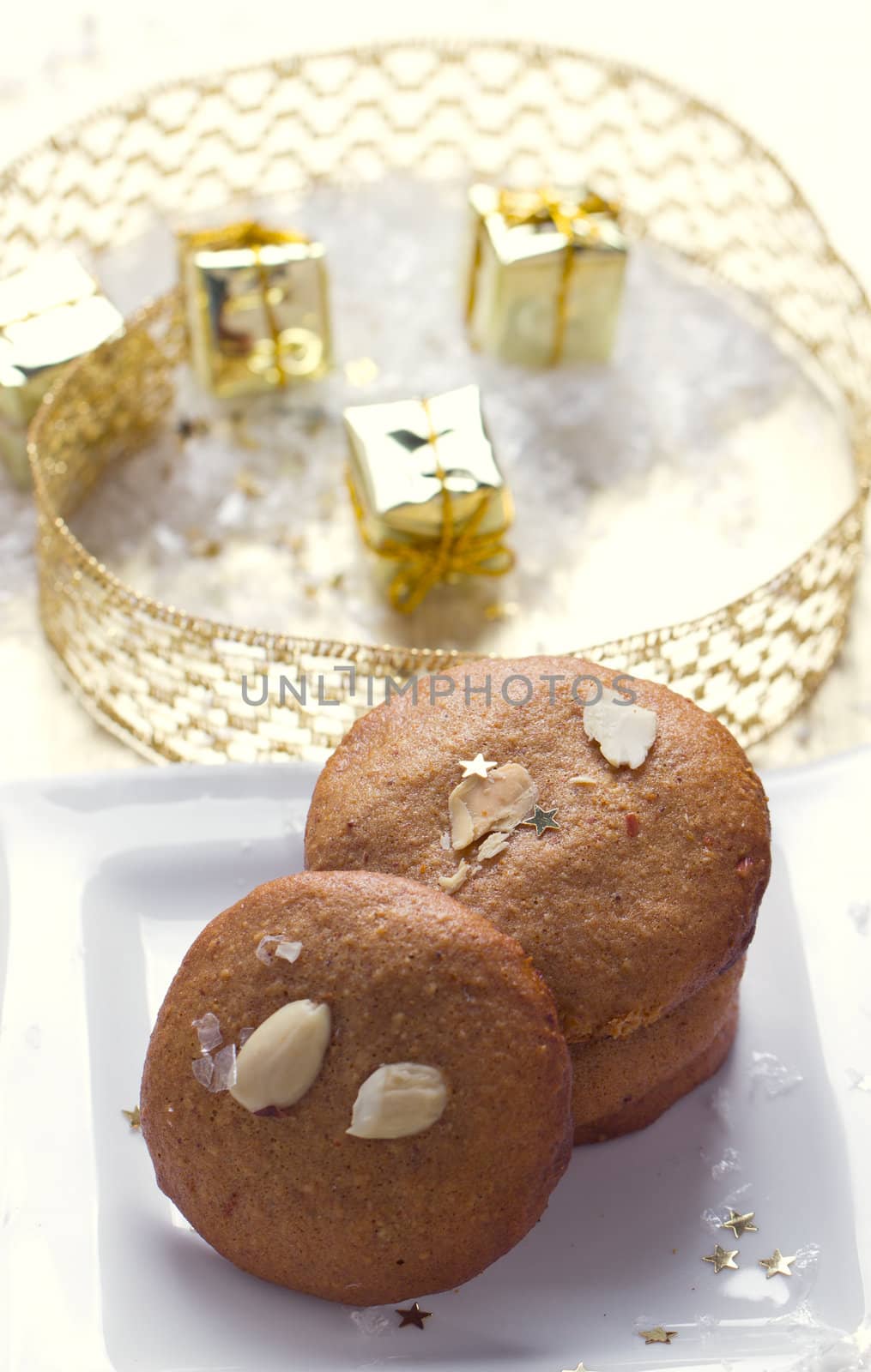 Cookies with nuts on the background of Christmas gifts
