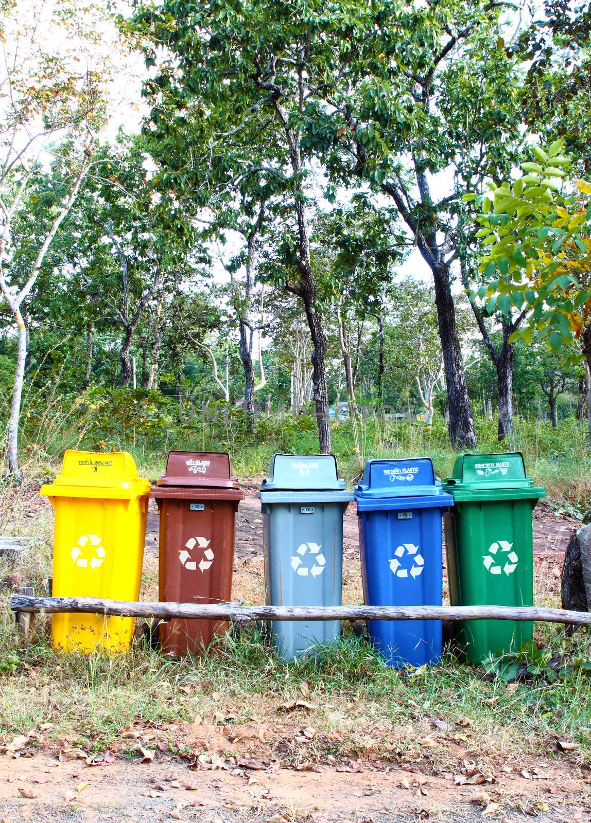 five colors recycle bins in the park