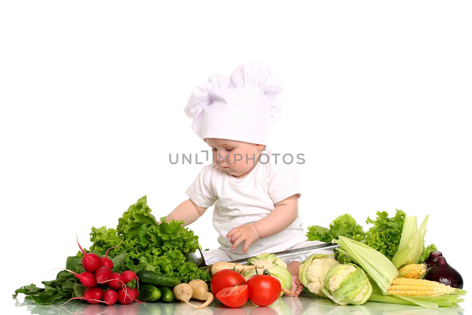 Baby cook with fresh vegetables isolated on a white