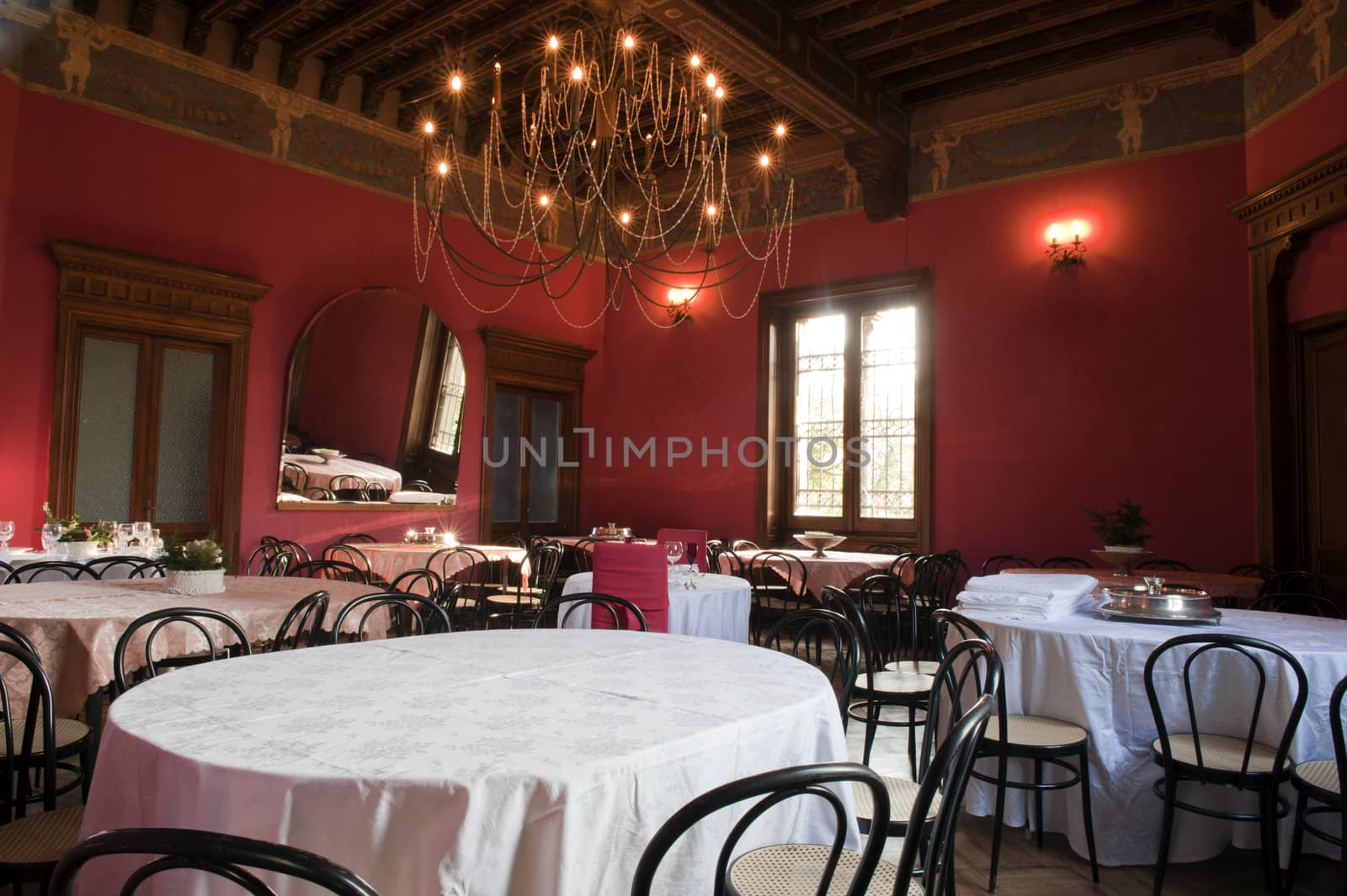 Dining room in the hall of an ancient castle.