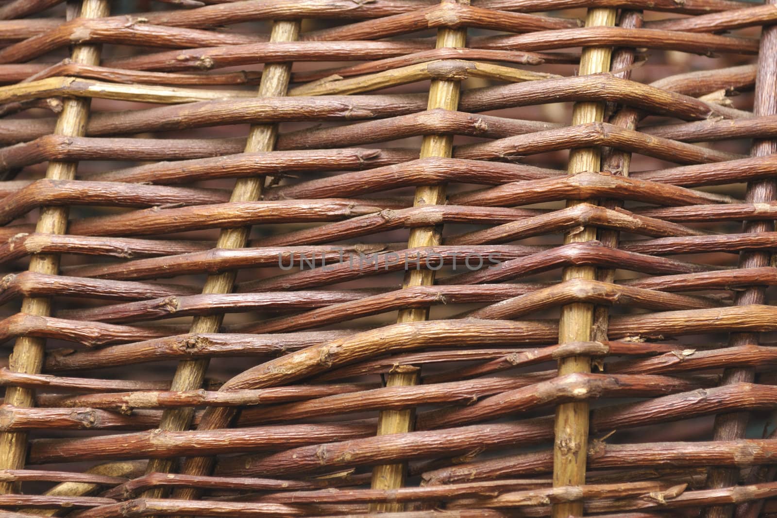 detailed close-up of vintage wooden weaving pattern made from willow shoots