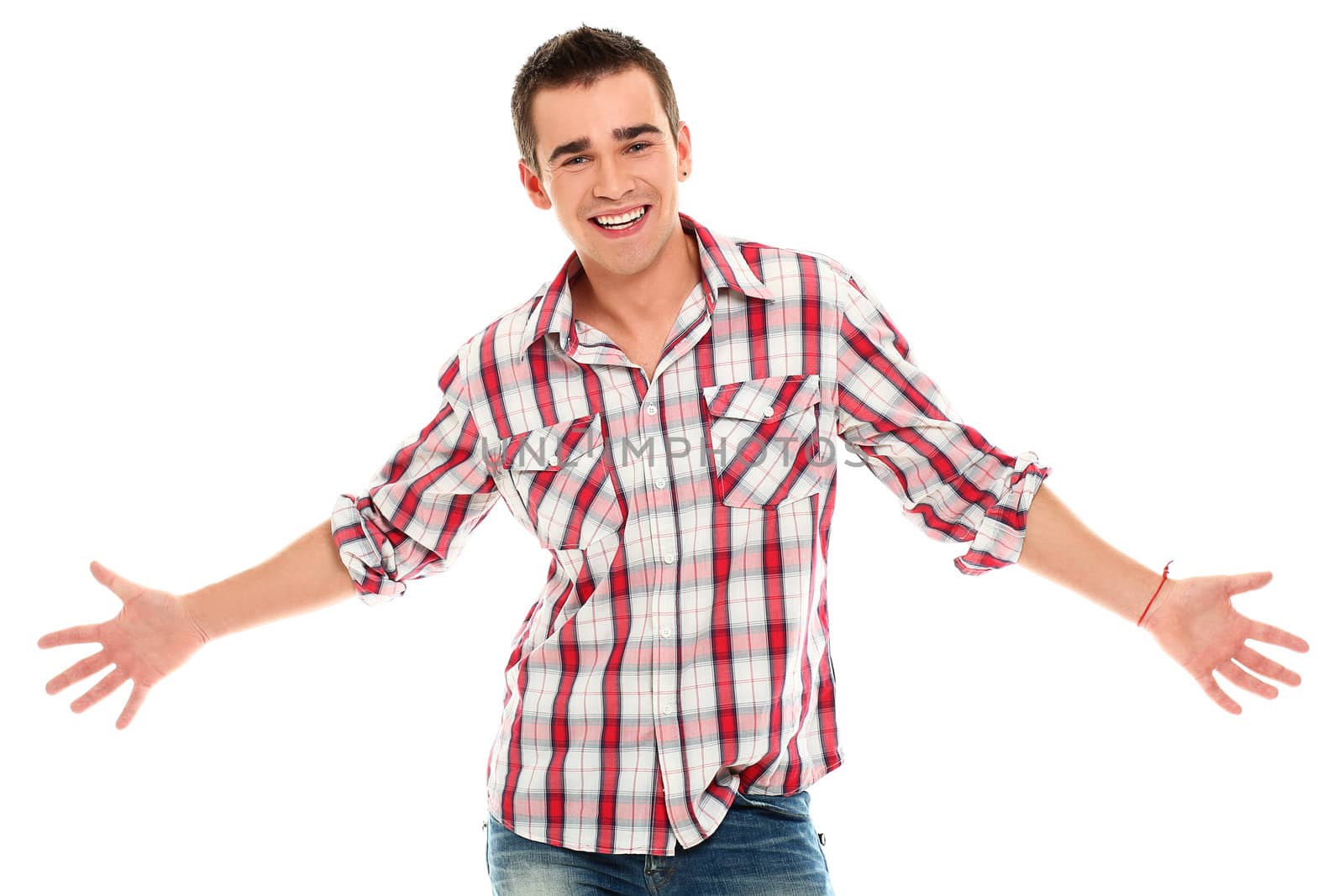 Handsome and young positive man with open hands isolated on a white