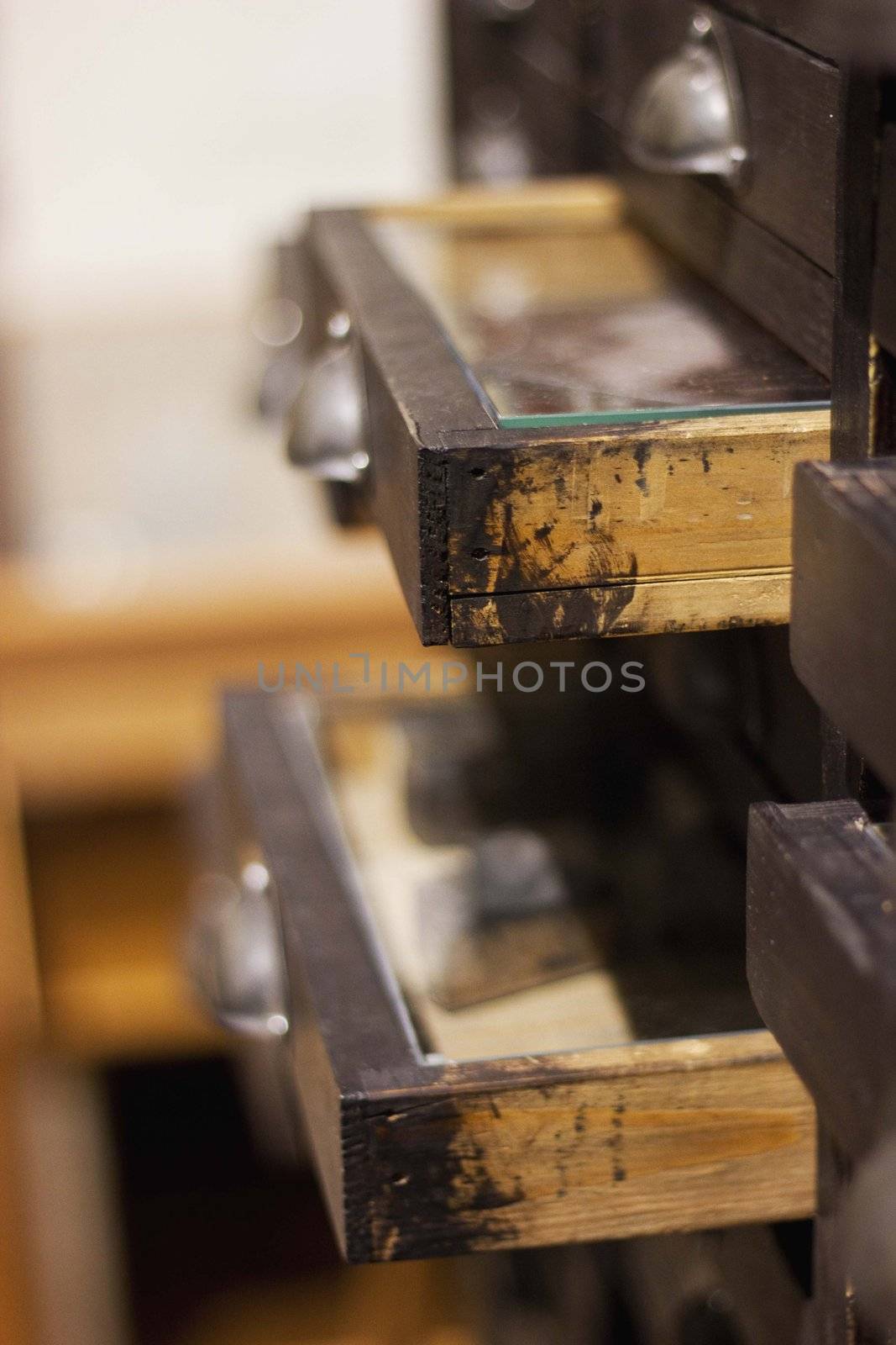 Close up of vintage chest with open drawers