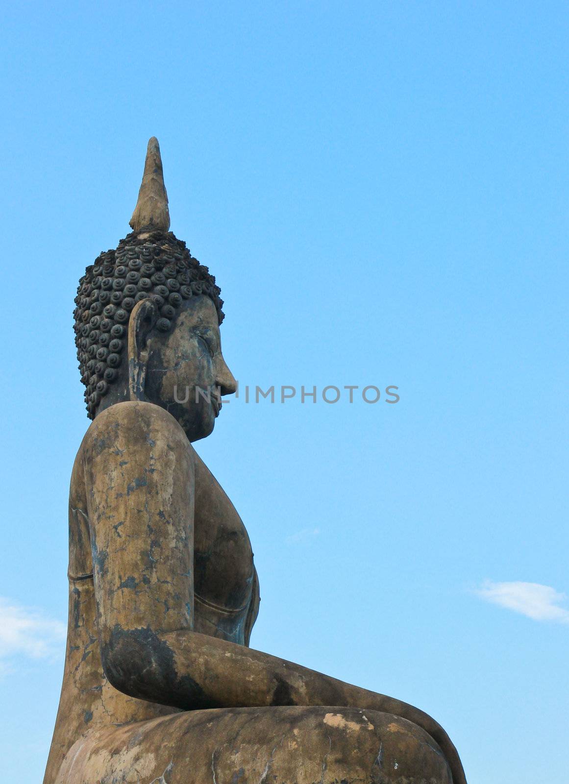 Buddha Statue in Wat Mahathat Temple in Sukhothai Historical Par by nuchylee