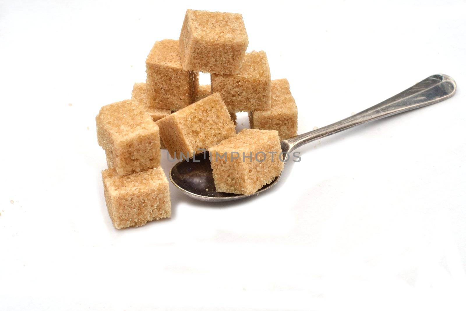 Brown Sugar Cubes on spoon