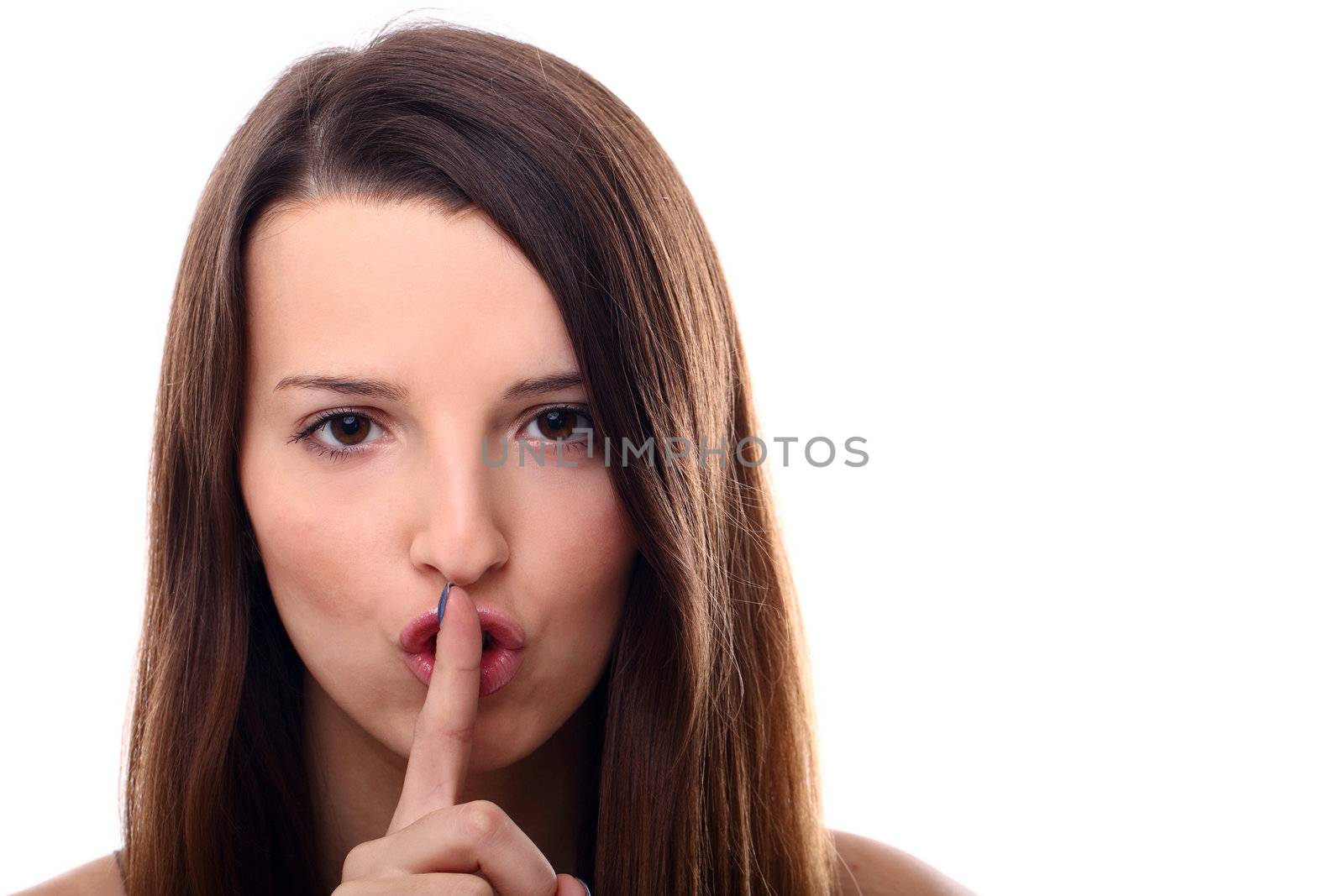 Portrait of young woman doing tss gesture over a white background