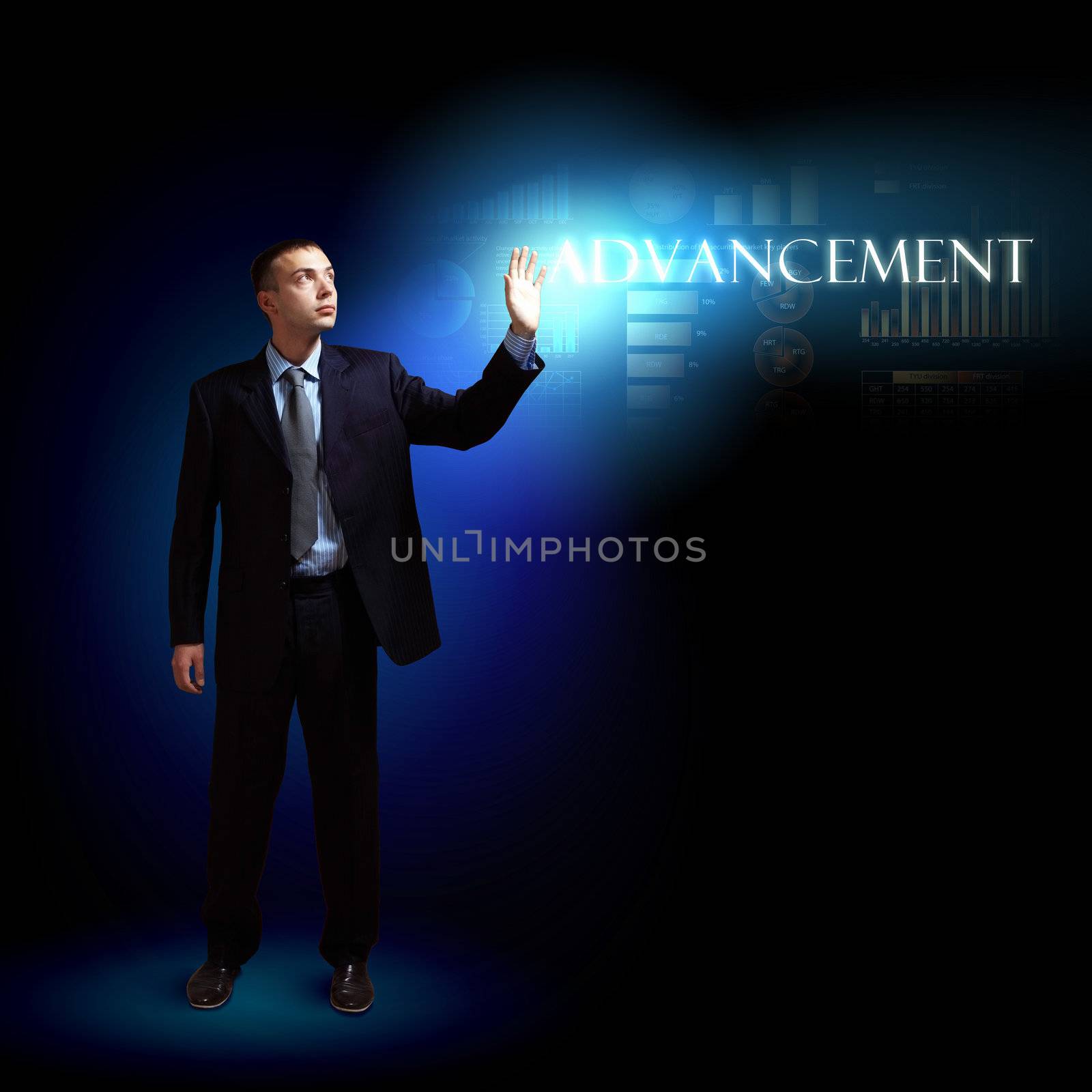 Young successful businessman holding a shining light in his hand as a symbol of success and advancement.