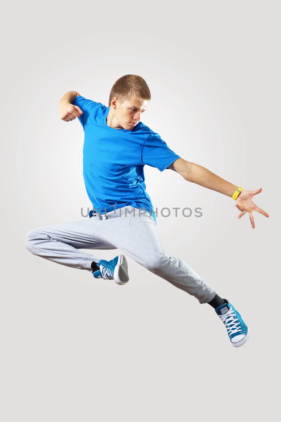 Young hiphop dancer making a move on white