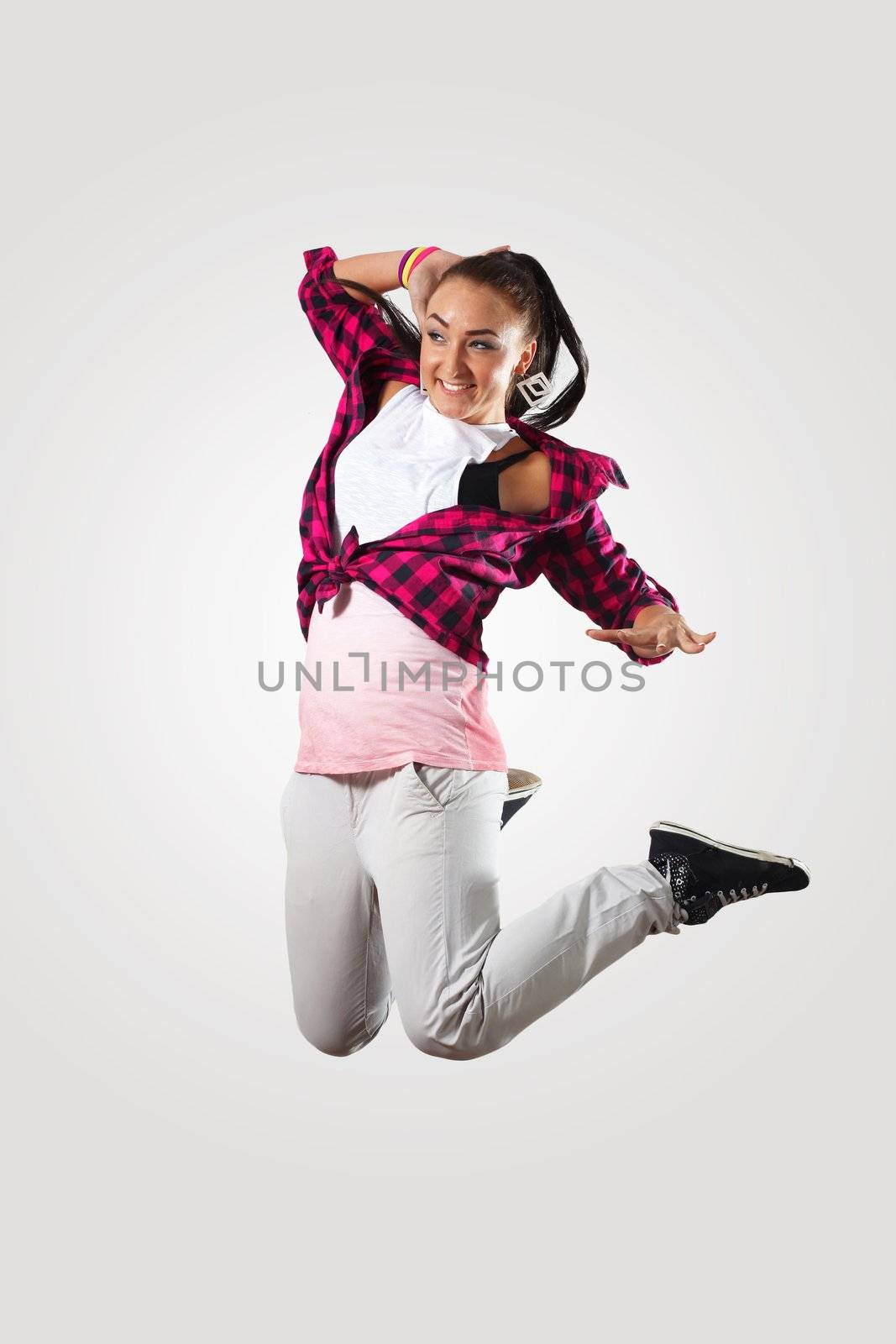 Young hiphop dancer making a move on white