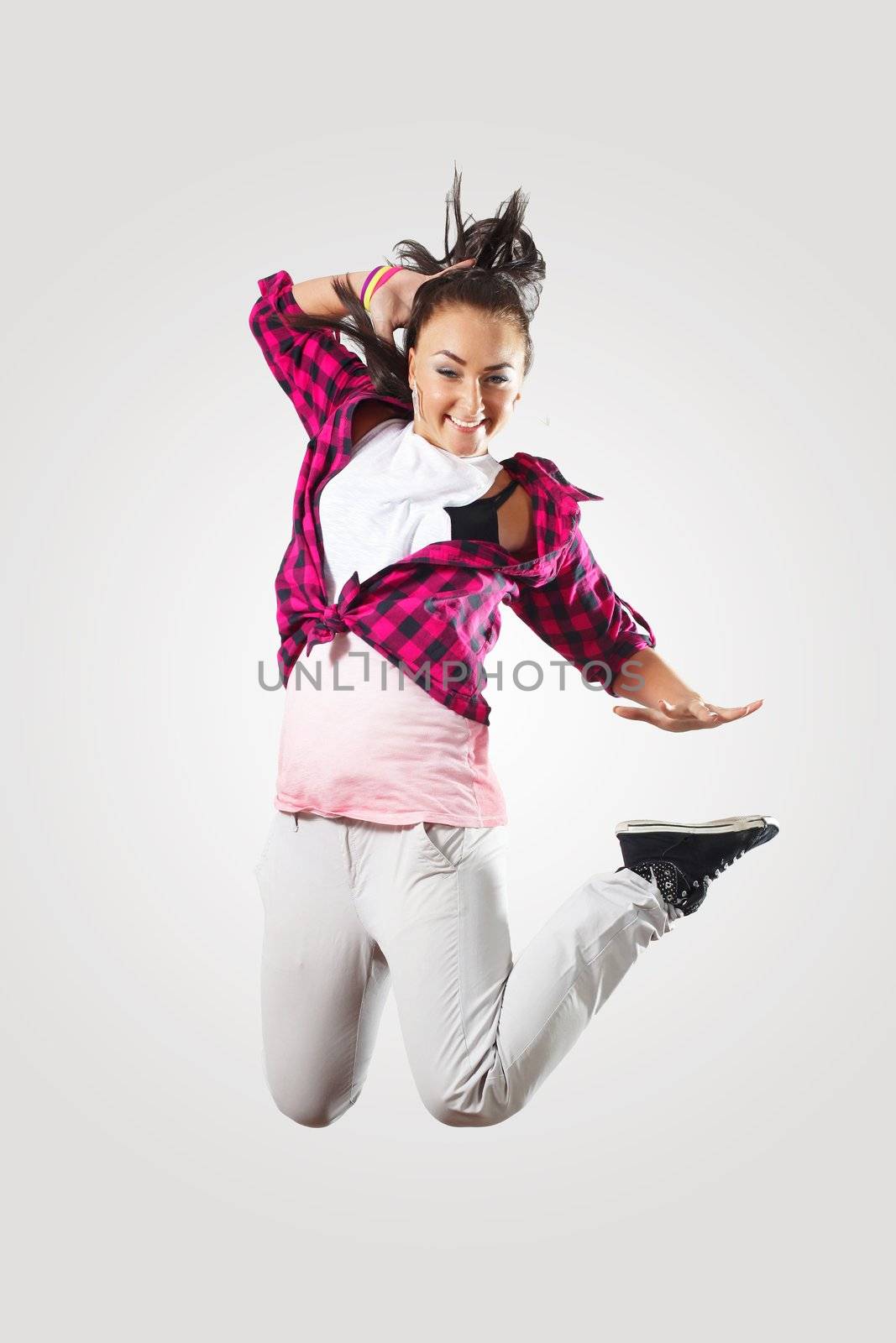 Young hiphop dancer making a move on white