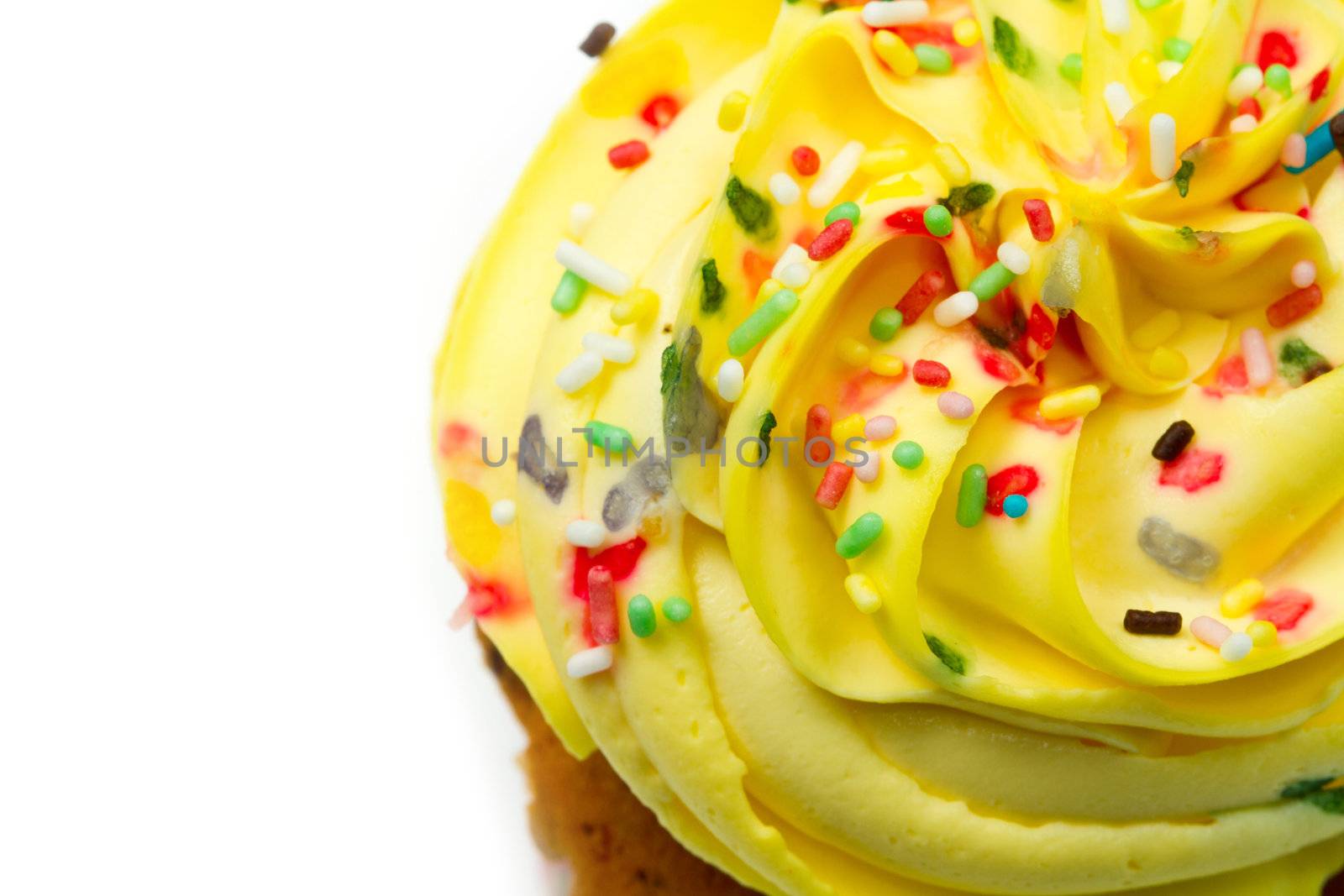 Delicious vanilla cup cake with yellow icing