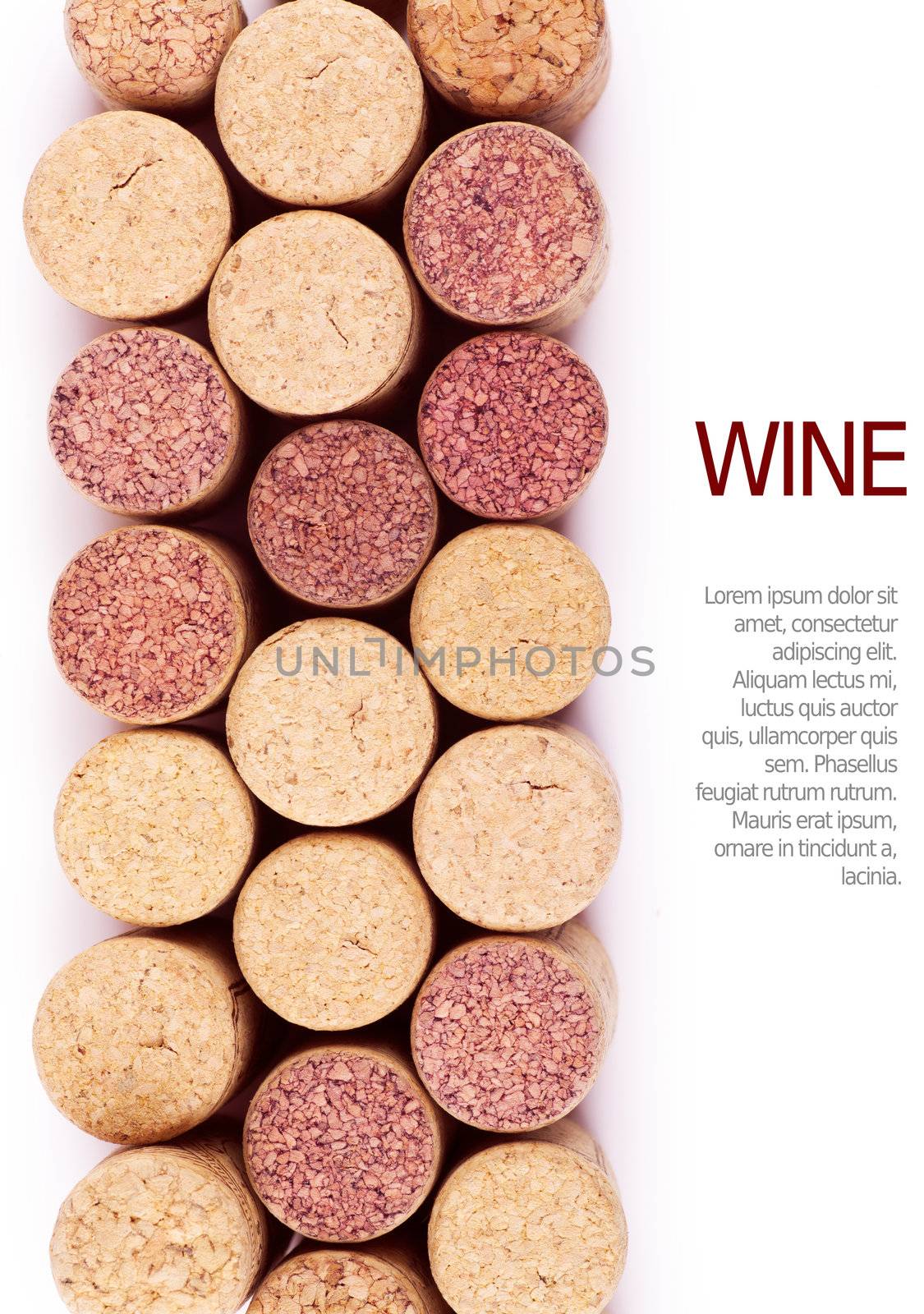 Closeup top view of wine corks over white background
