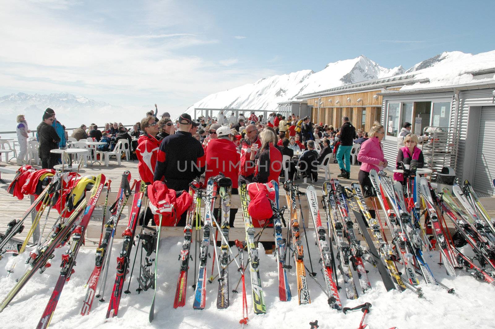 Montain ski resort near Sion, Swetzeland - March 2007. Mountain skiers prepare for descent.