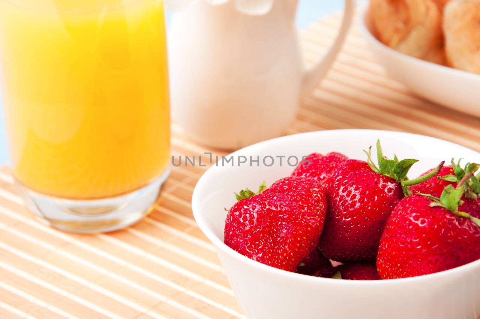 Breakfast with berries,orange juice and croissant, early breakfast