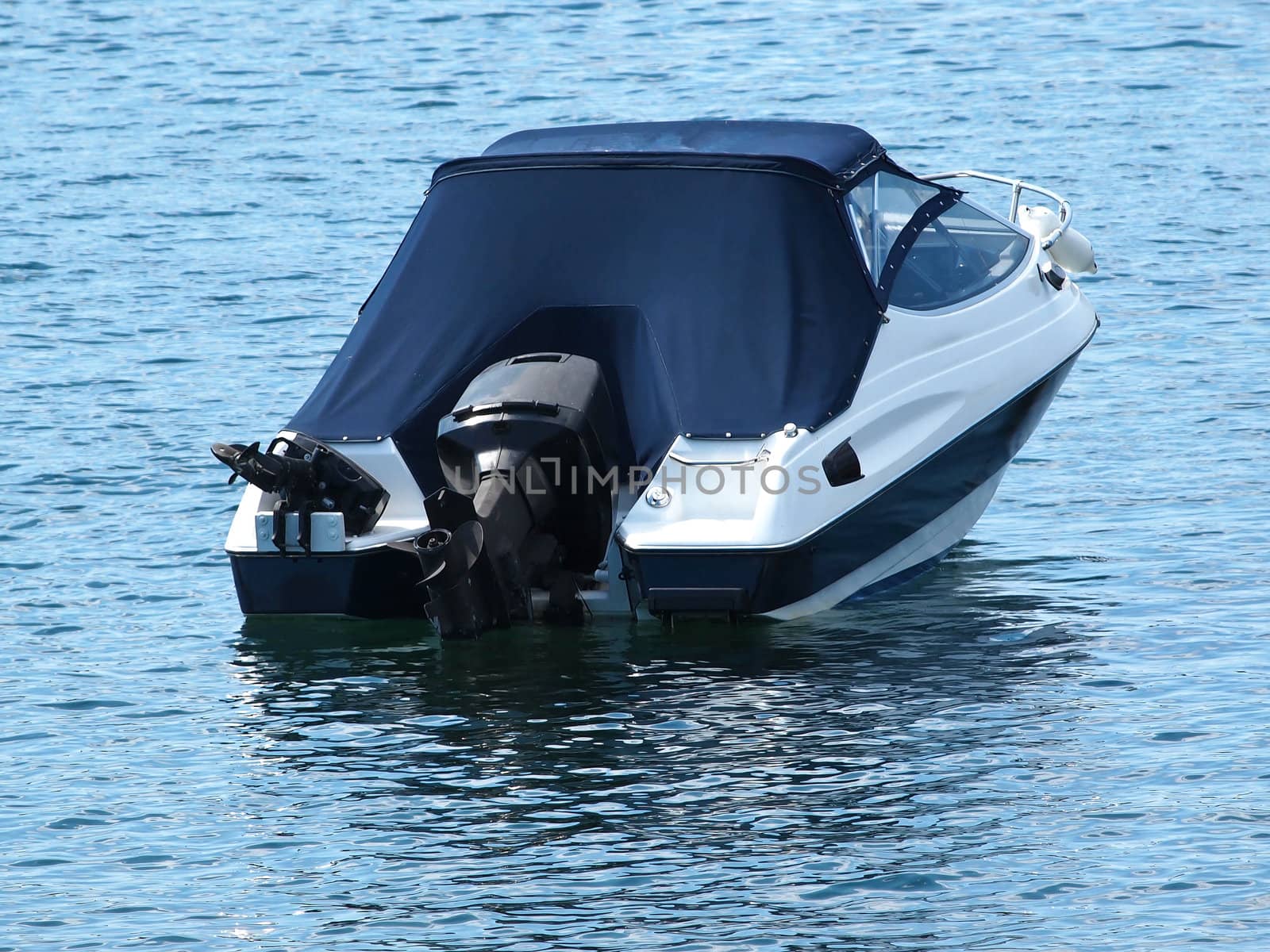 speed boat anchored in the bay