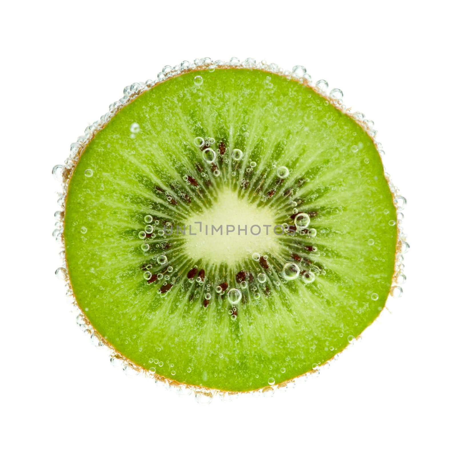 Kiwifruit slice in water with bubbles on white background