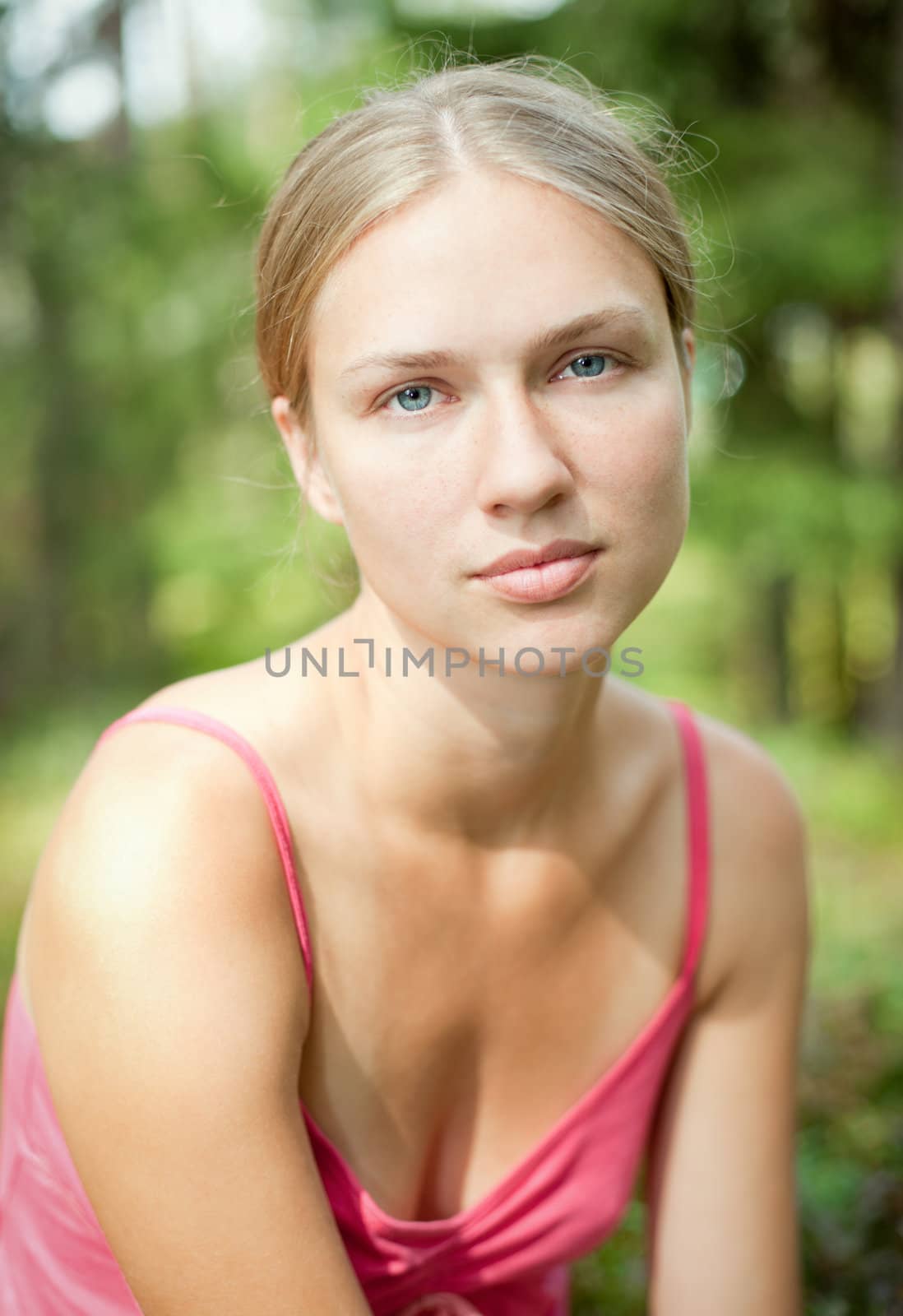 Outdoor portrait of a young caucasian female