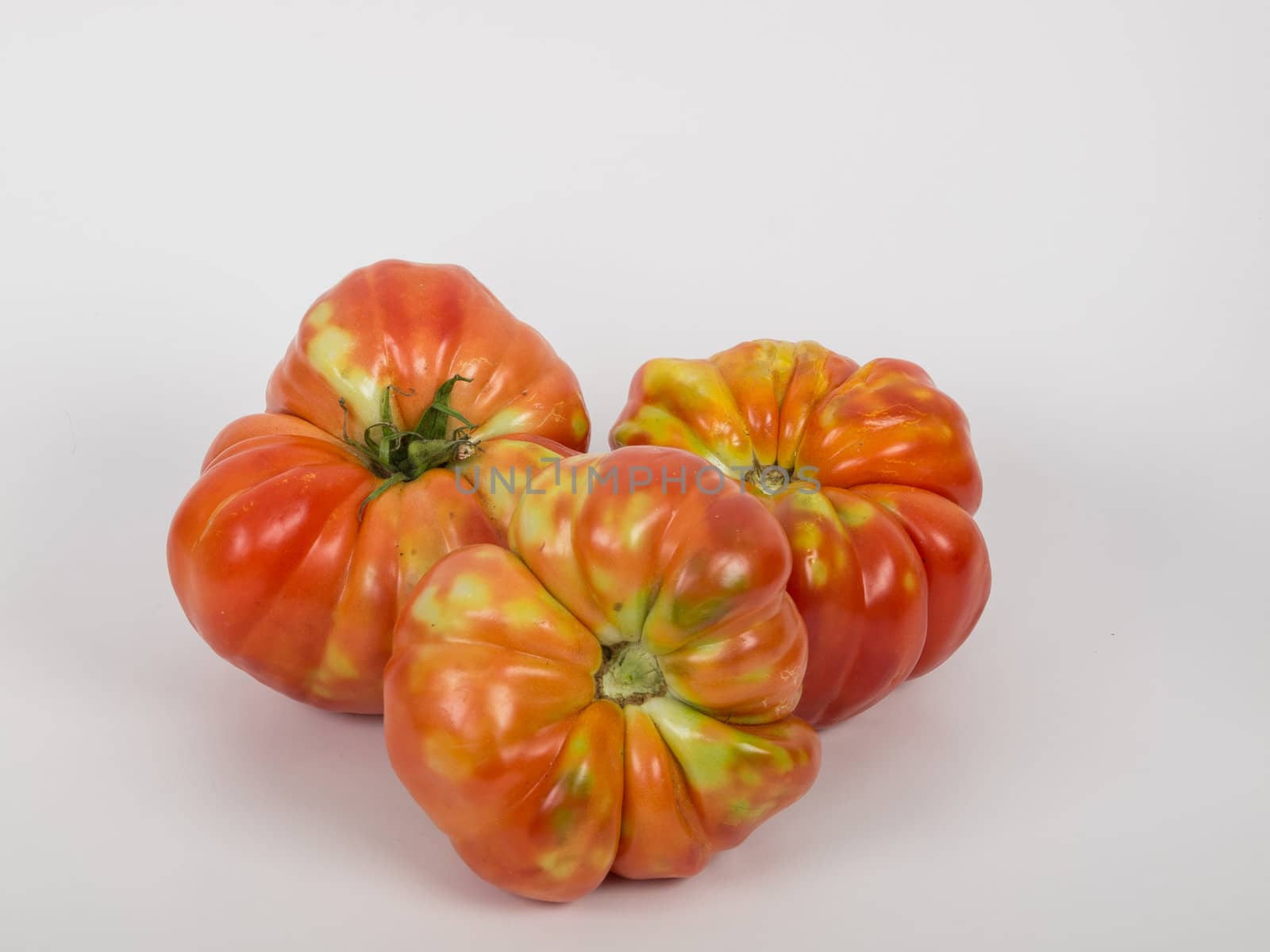 organic tomato isolated on white background
