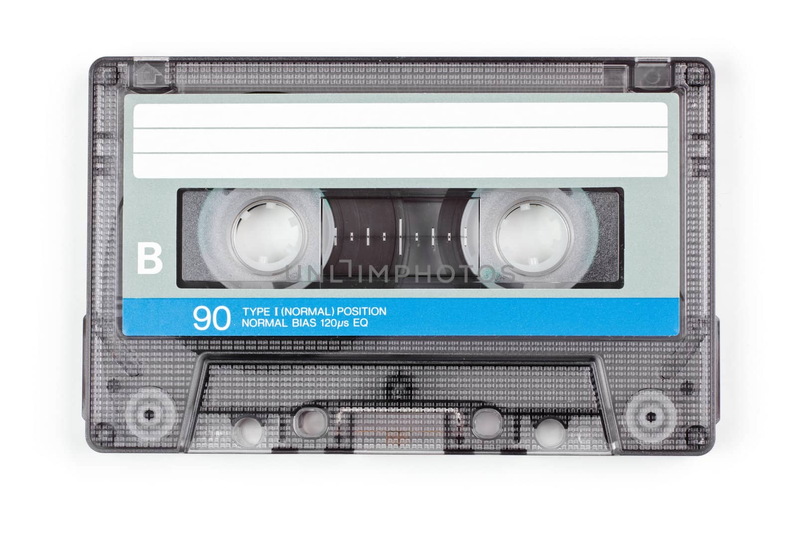 Vintage transparent Compact Cassette on white background