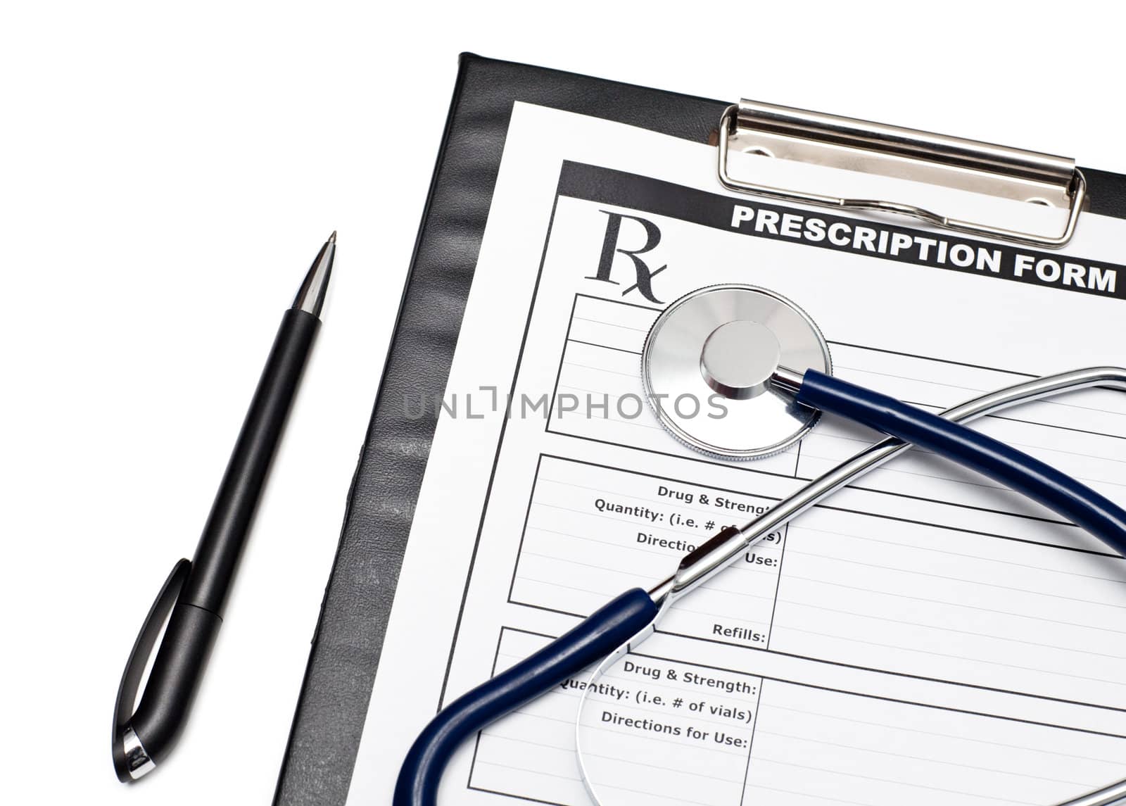 Blank prescription form on clipboard with stethoscope and pen