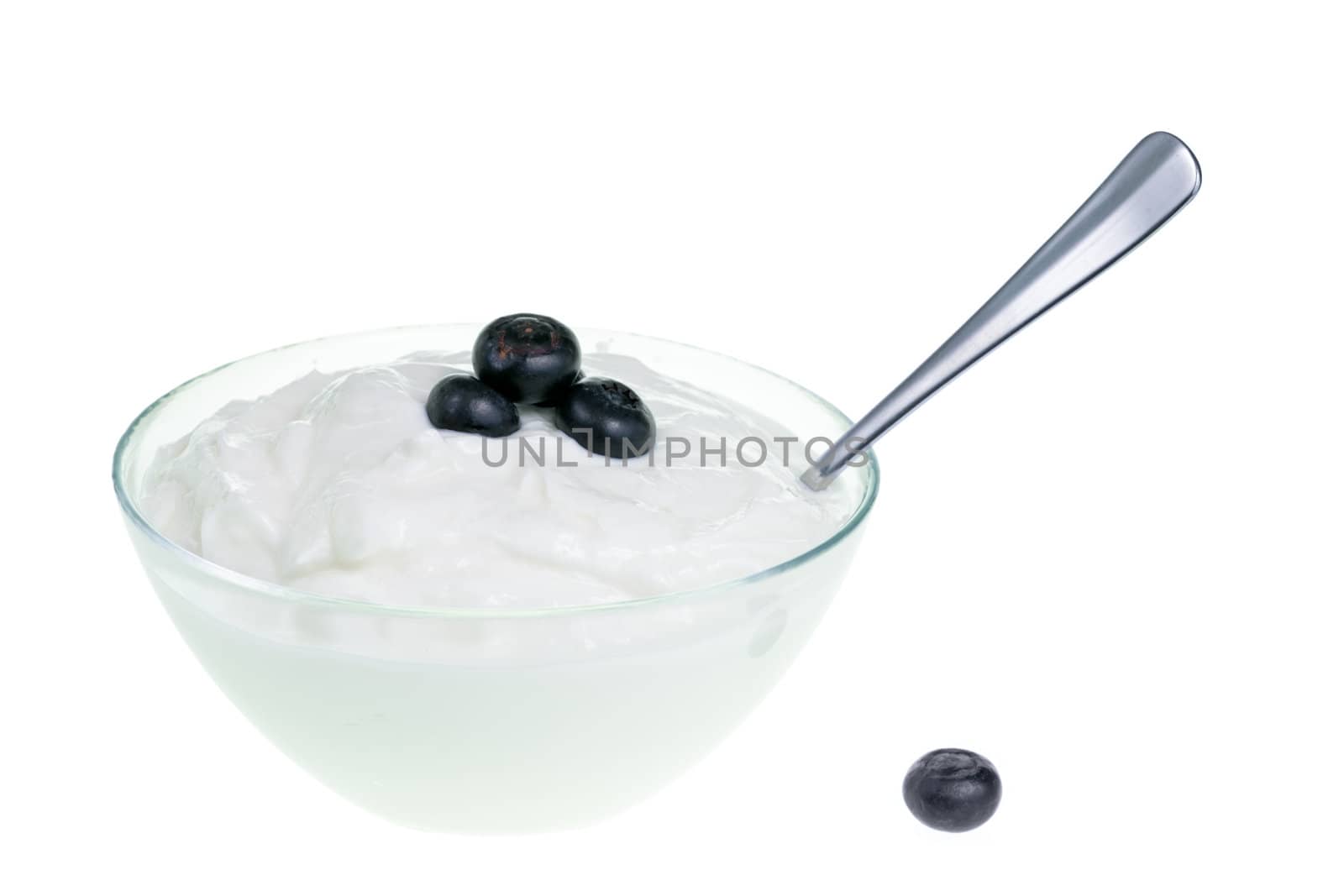 Yogurt bowl with spoon and Blueberries on white background