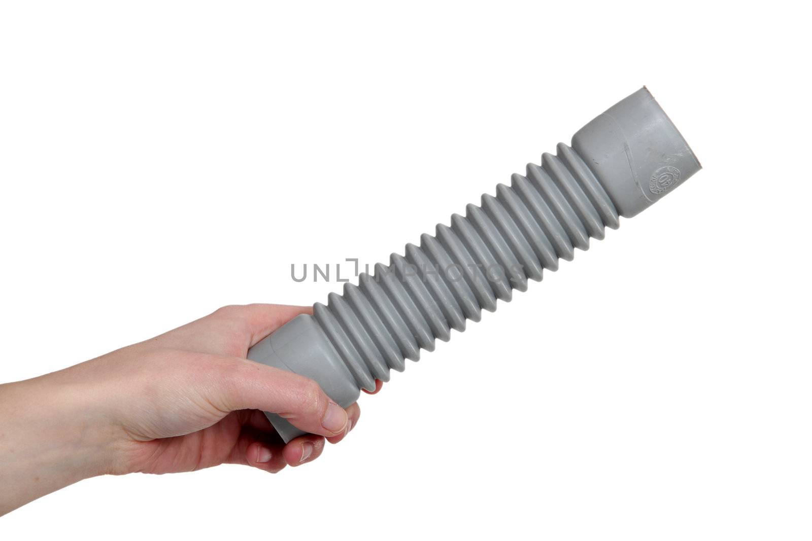 Hand holding corrugated pipe by phovoir