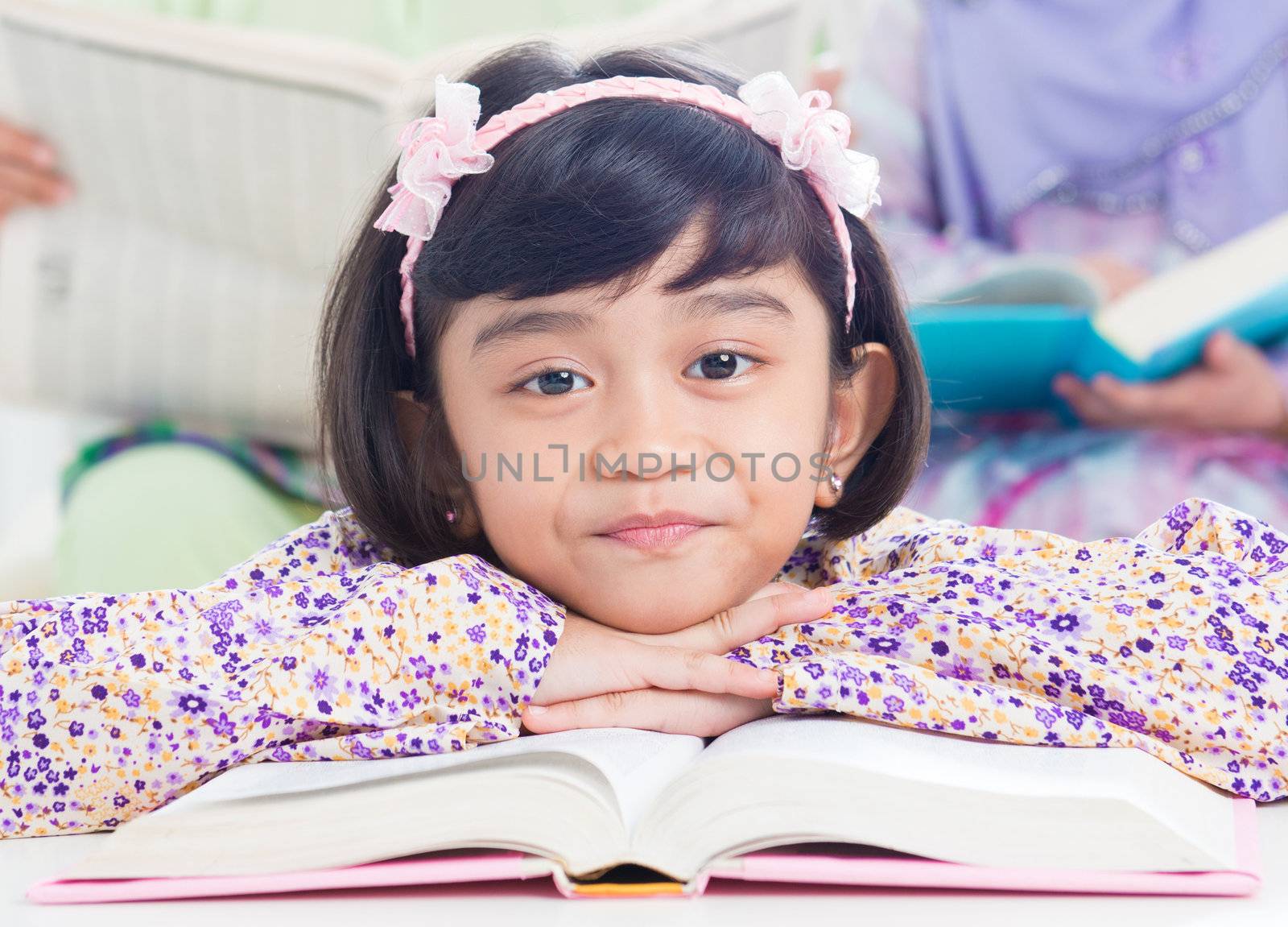 Muslim girl reading by szefei