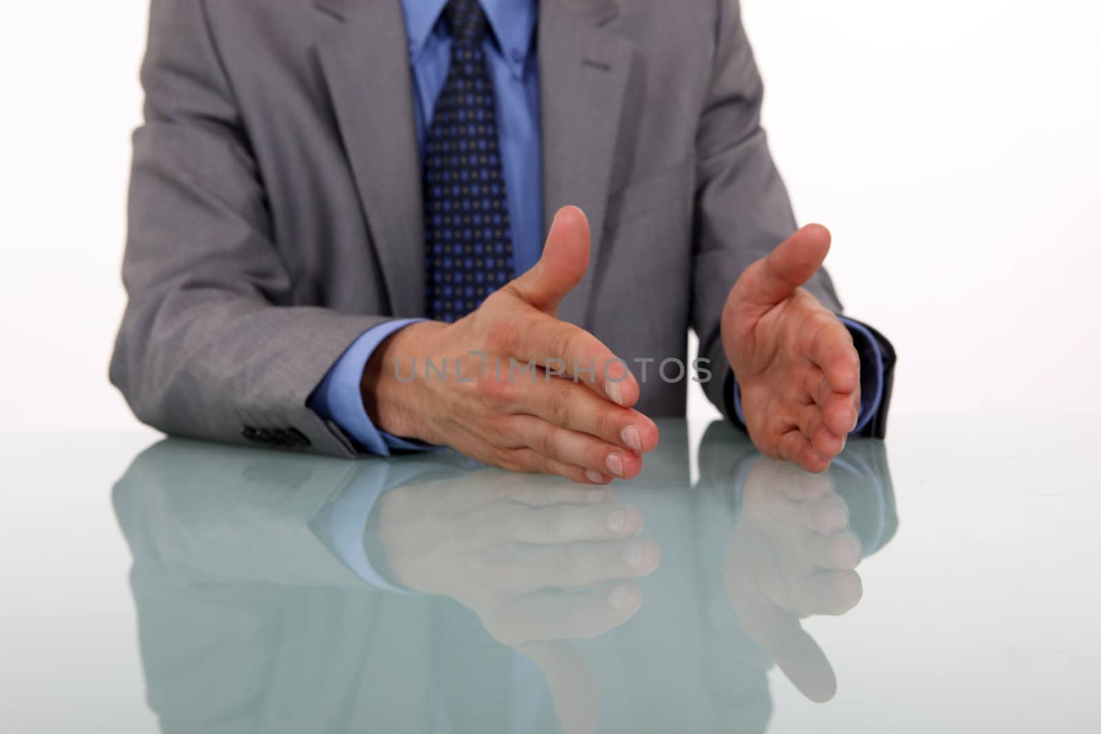 businessman hands gesturing while speaking by phovoir