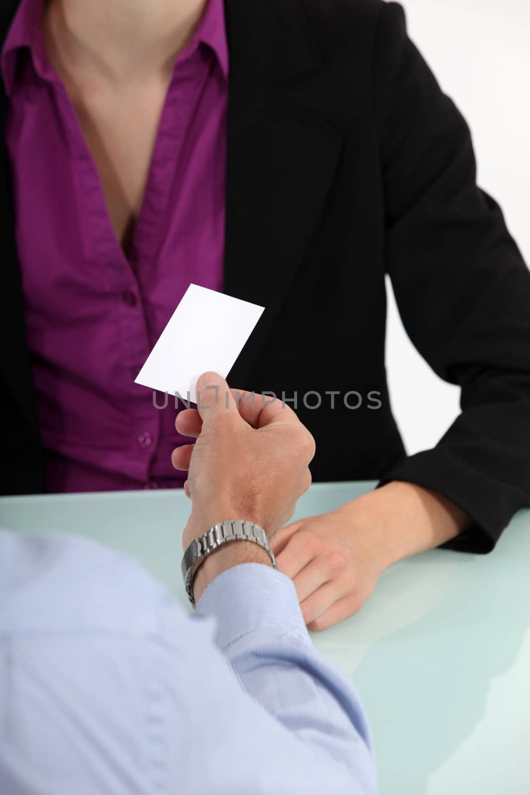 businessman giving his business card by phovoir