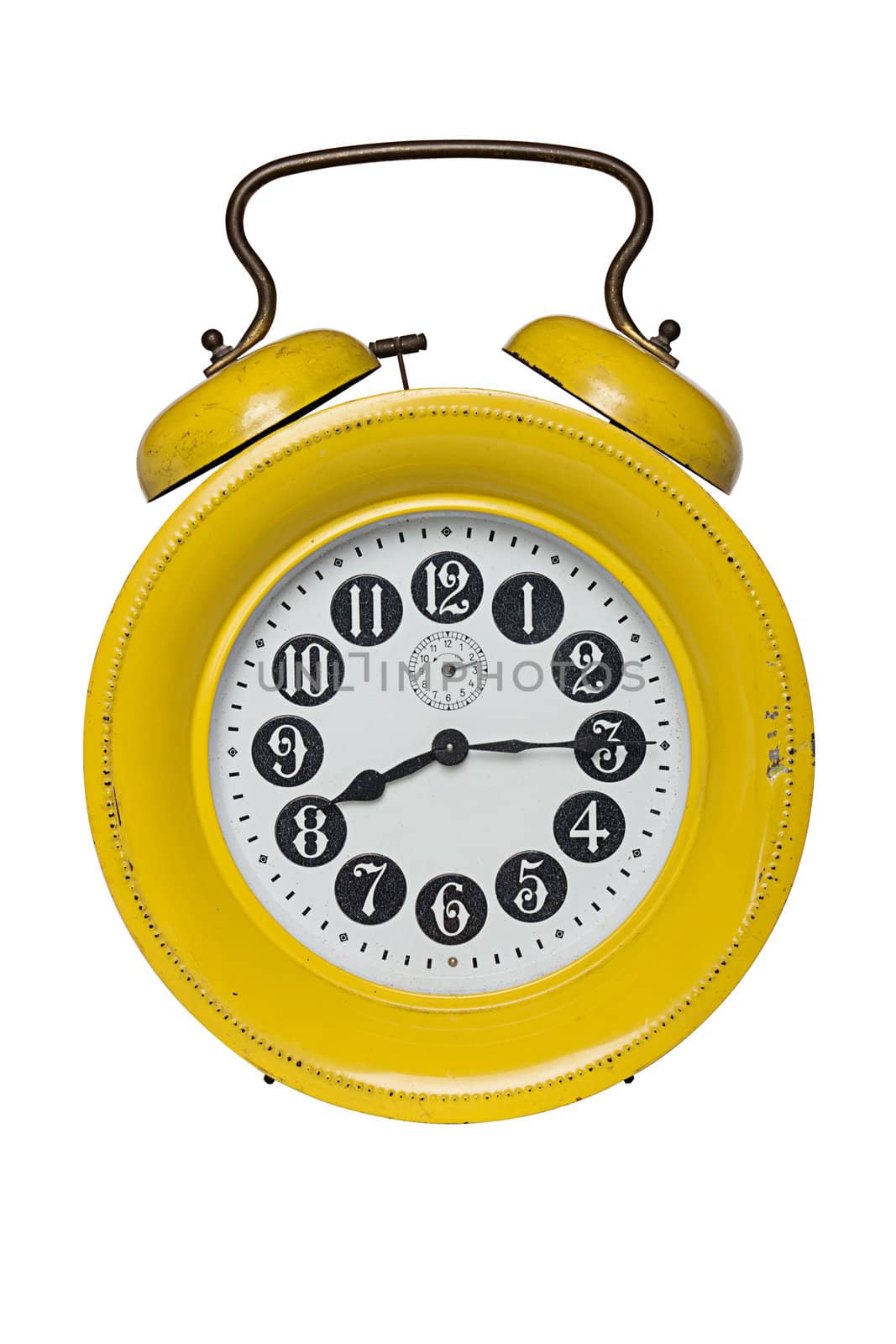 Old alarm clock isolated on white