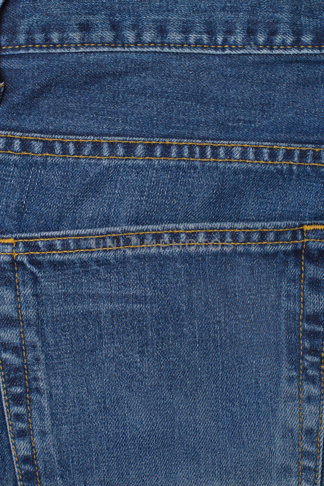 A denium blue jean pocket shot up close