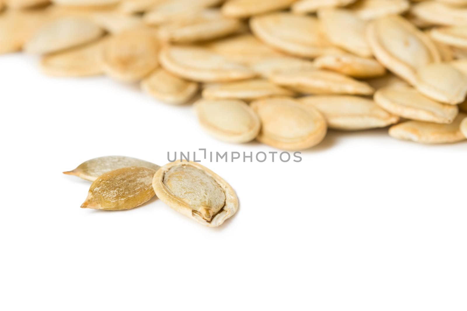 Pumpkin seeds isolated on the white background