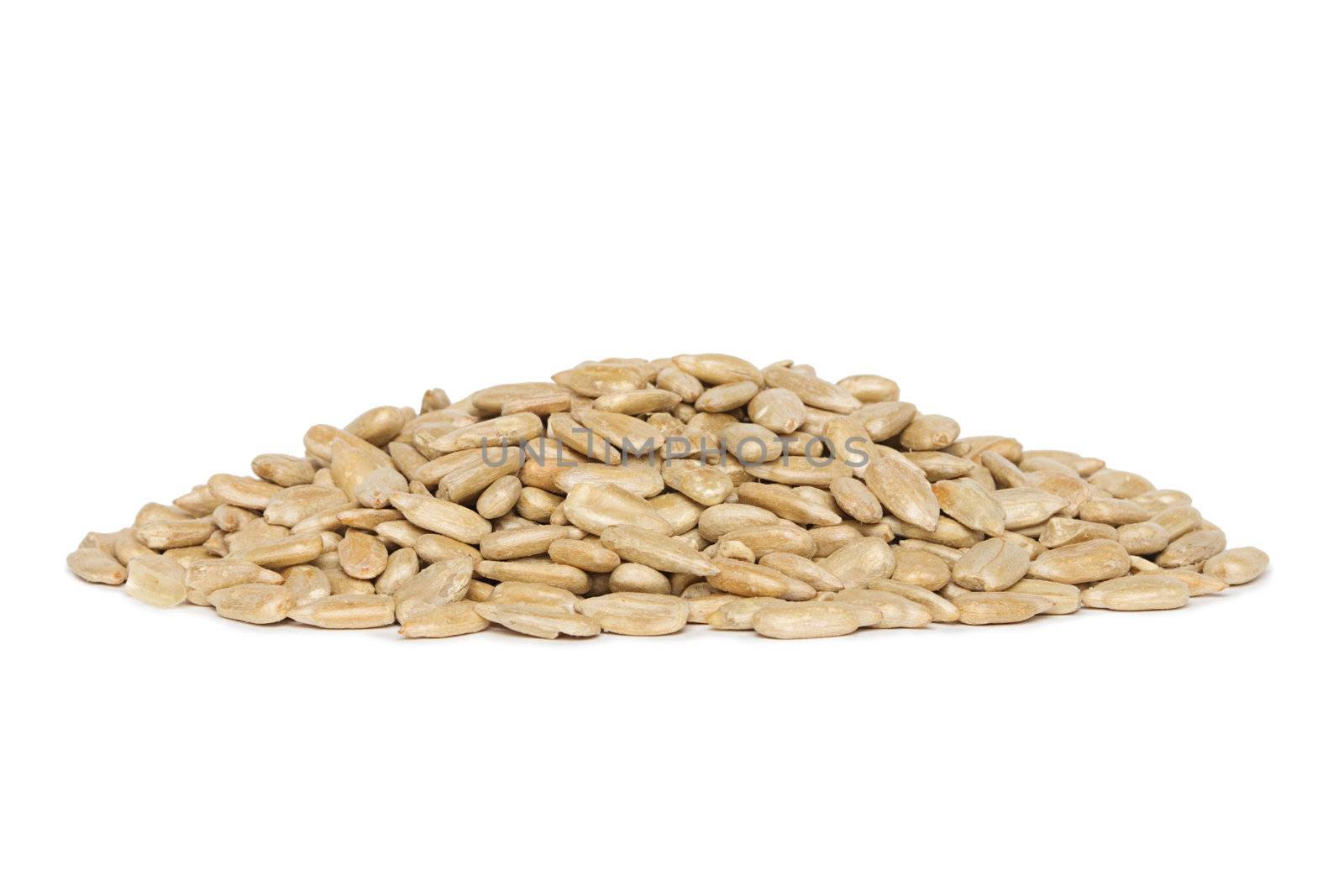 fresh sunflower seeds isolated on a white background