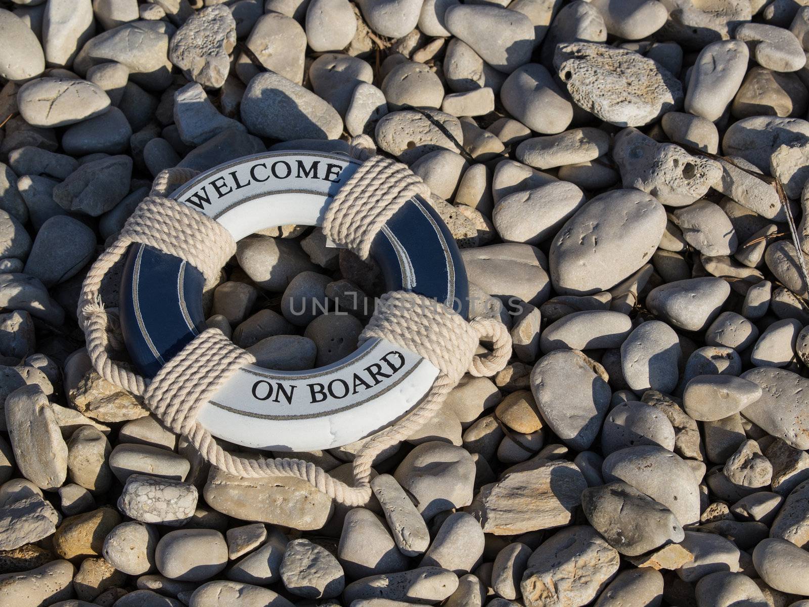  welcome safe safe belt on the stone beach
 