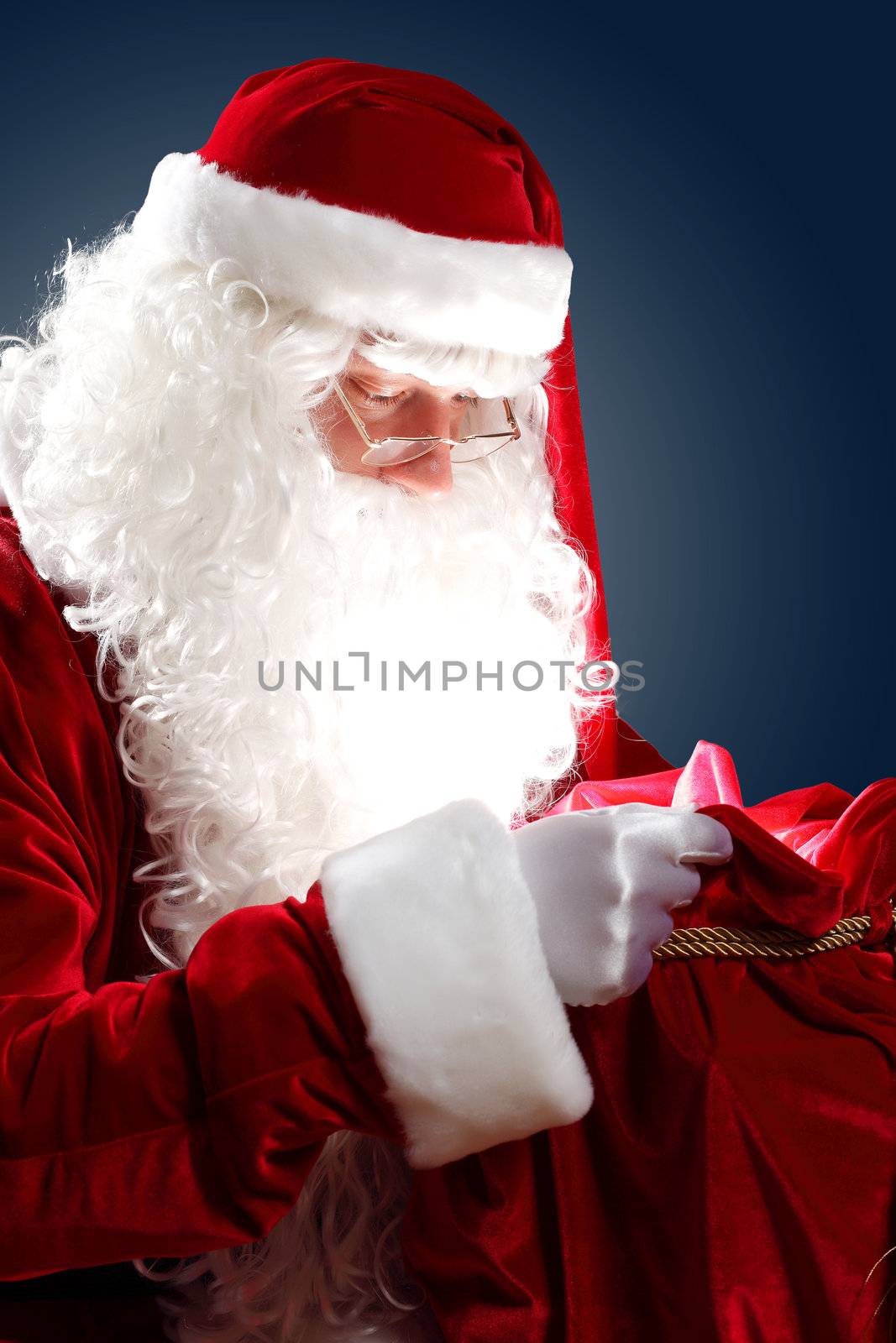 santa claus with his gift bag by sergey_nivens