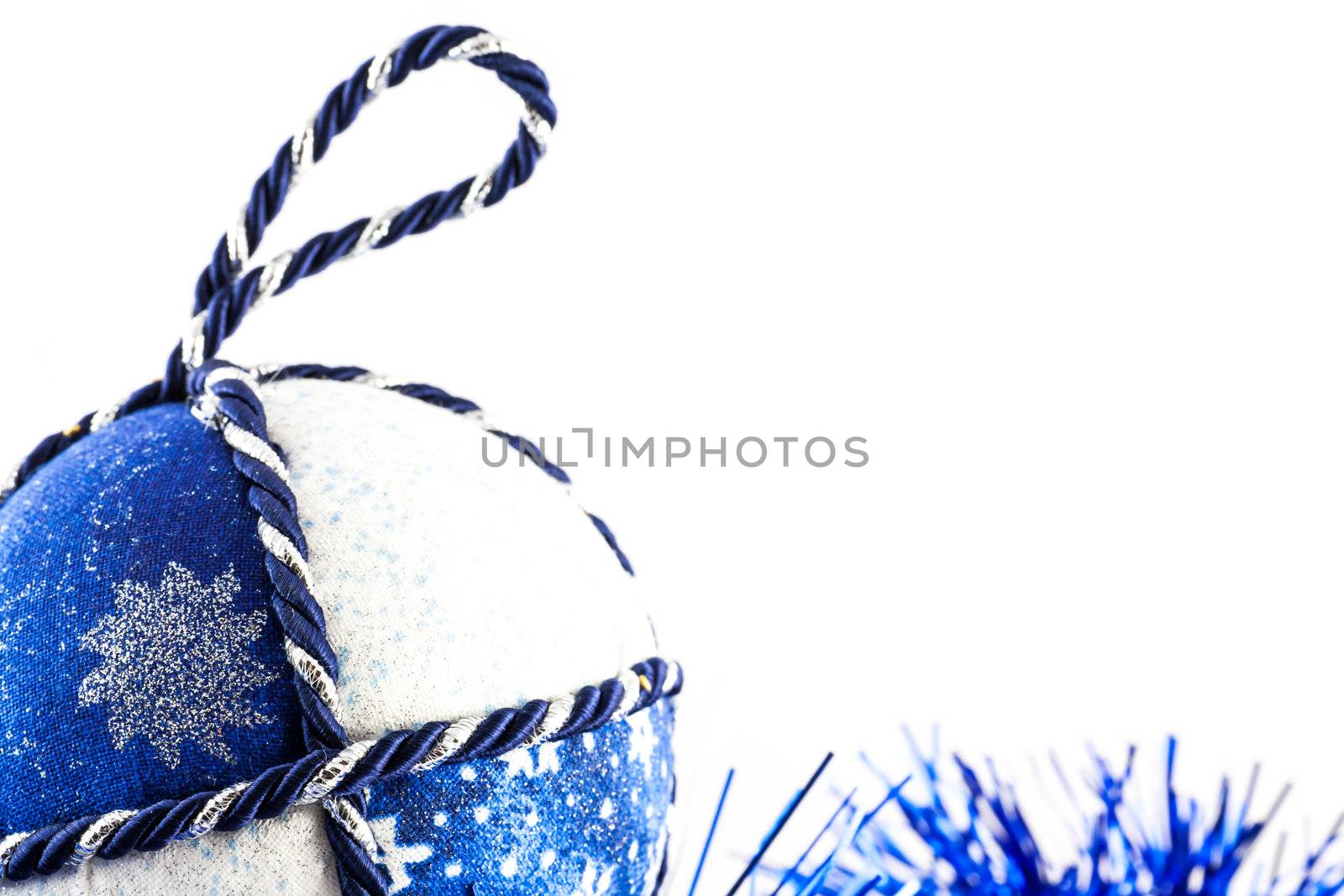 Italy. Traditional handmade Christmas ball made of white and blue fabric